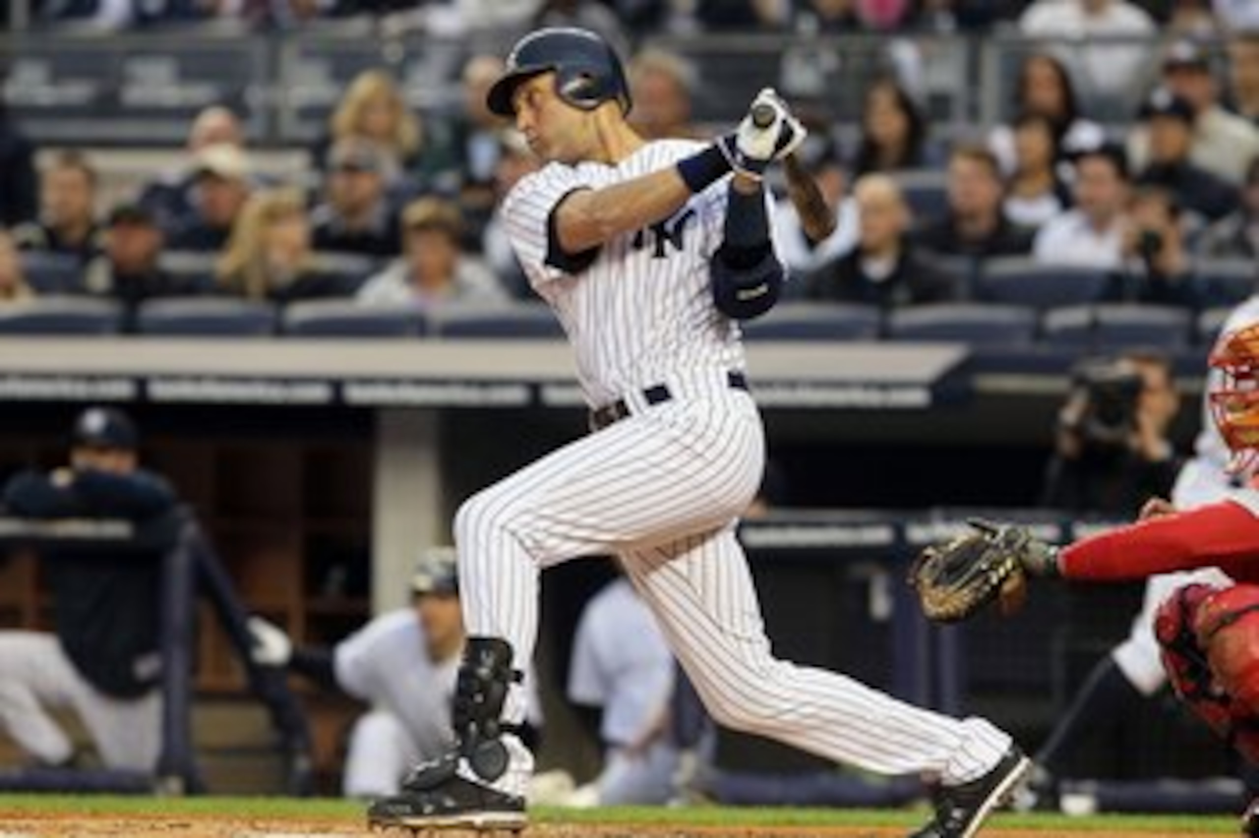 NEW YORK, NY - MAY 14:  Derek Jeter #2 of the New York Yankees bats against the Boston Red Sox on May 14, 2011 at Yankee Stadium in the Bronx borough of New York City.  (Photo by Jim McIsaac/Getty Images)