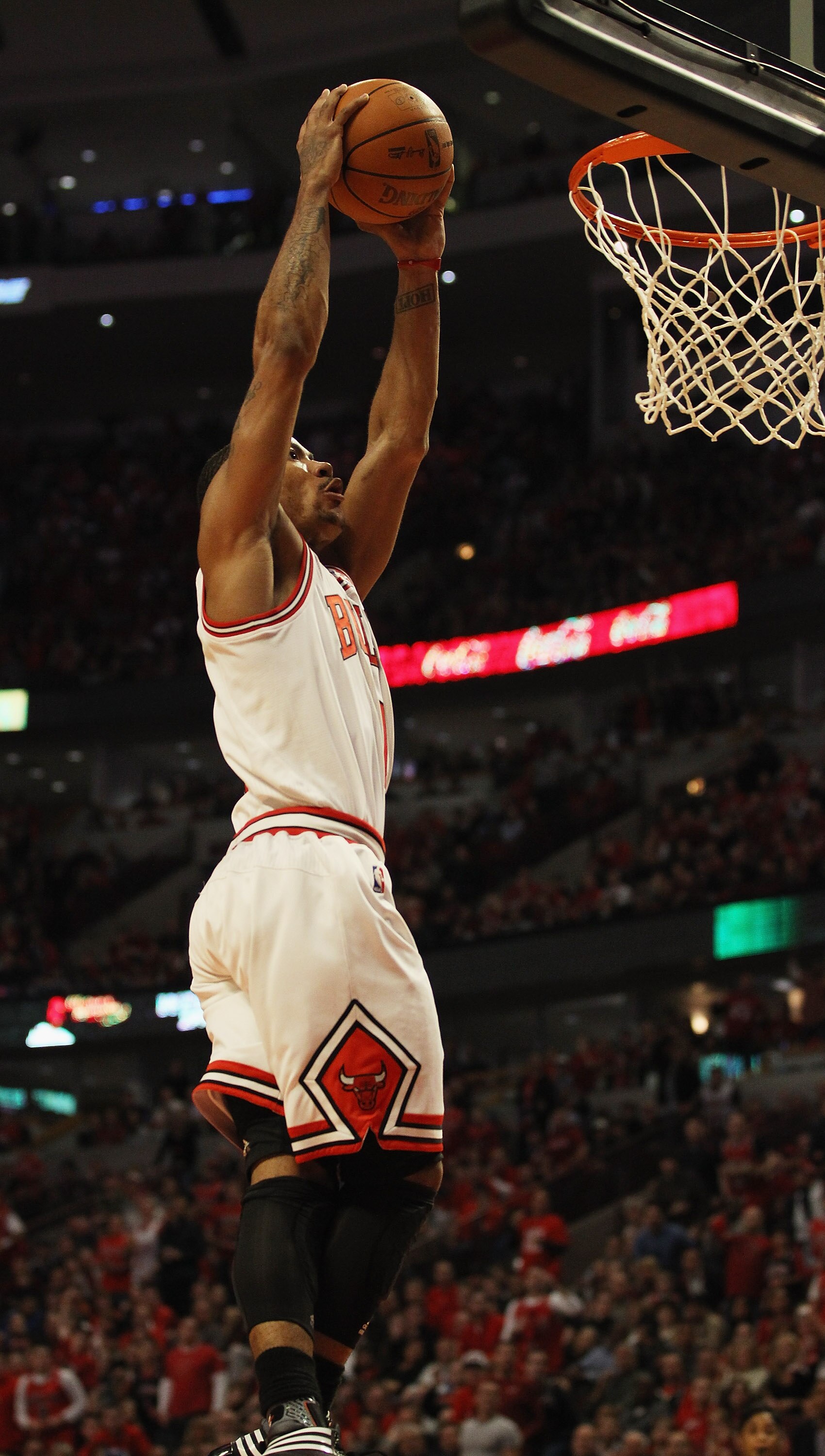 CHICAGO, IL - APRIL 16: Derrick Rose #1 of the Chicago Bulls goes up for a dunk against the Indiana Pacers in Game One of the Eastern Conference Quarterfinals in the 2011 NBA Playoffs at the United Center on April 16, 2011 in Chicago, Illinois. The Bulls