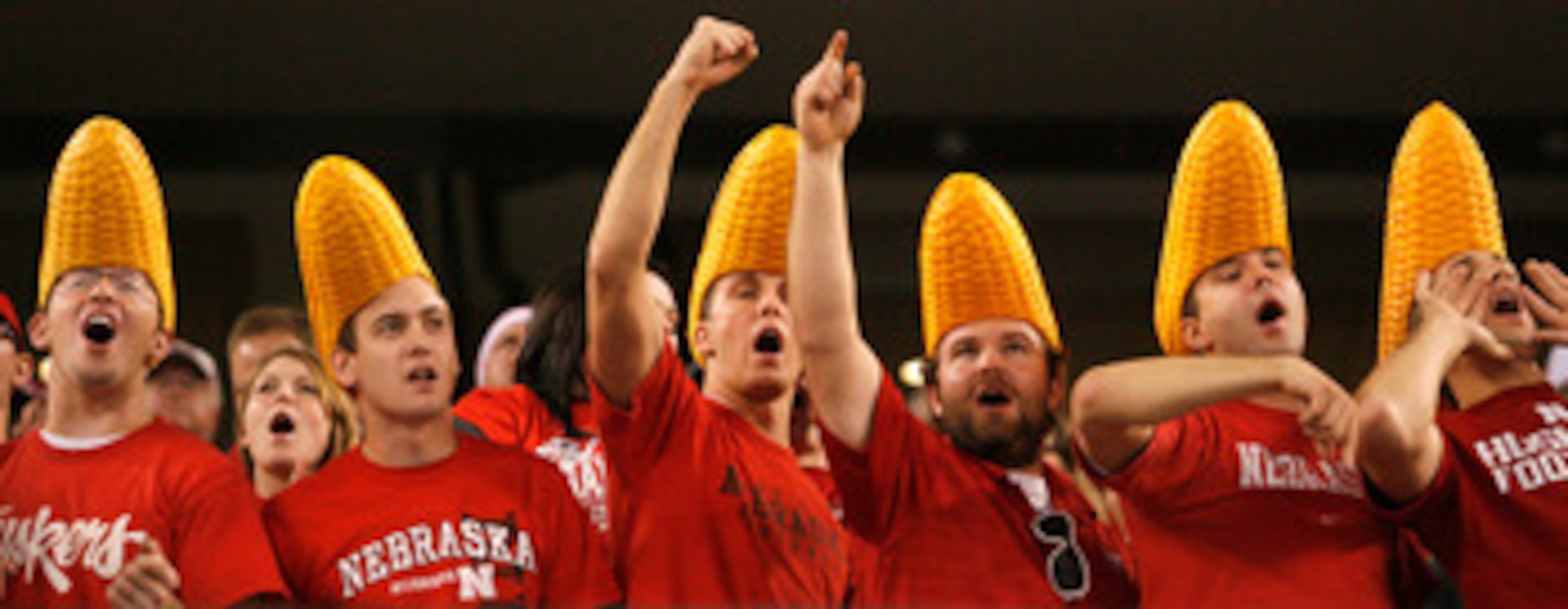 ARLINGTON, TX - DECEMBER 04: Nebraska Cornhusker fans cheer on their team against the Oklahoma Sooners at Cowboys Stadium on December 4, 2010 in Arlington, Texas. The Sooners beat the Cornhuskers 23-20. (Photo by Tom Pennington/Getty Images) ARLINGTON, TX - DECEMBER 04: Nebraska Cornhusker fans cheer on their team against the Oklahoma Sooners at Cowboys Stadium on December 4, 2010 in Arlington, Texas. The Sooners beat the Cornhuskers 23-20. (Photo by Tom Pennington/Getty Images)