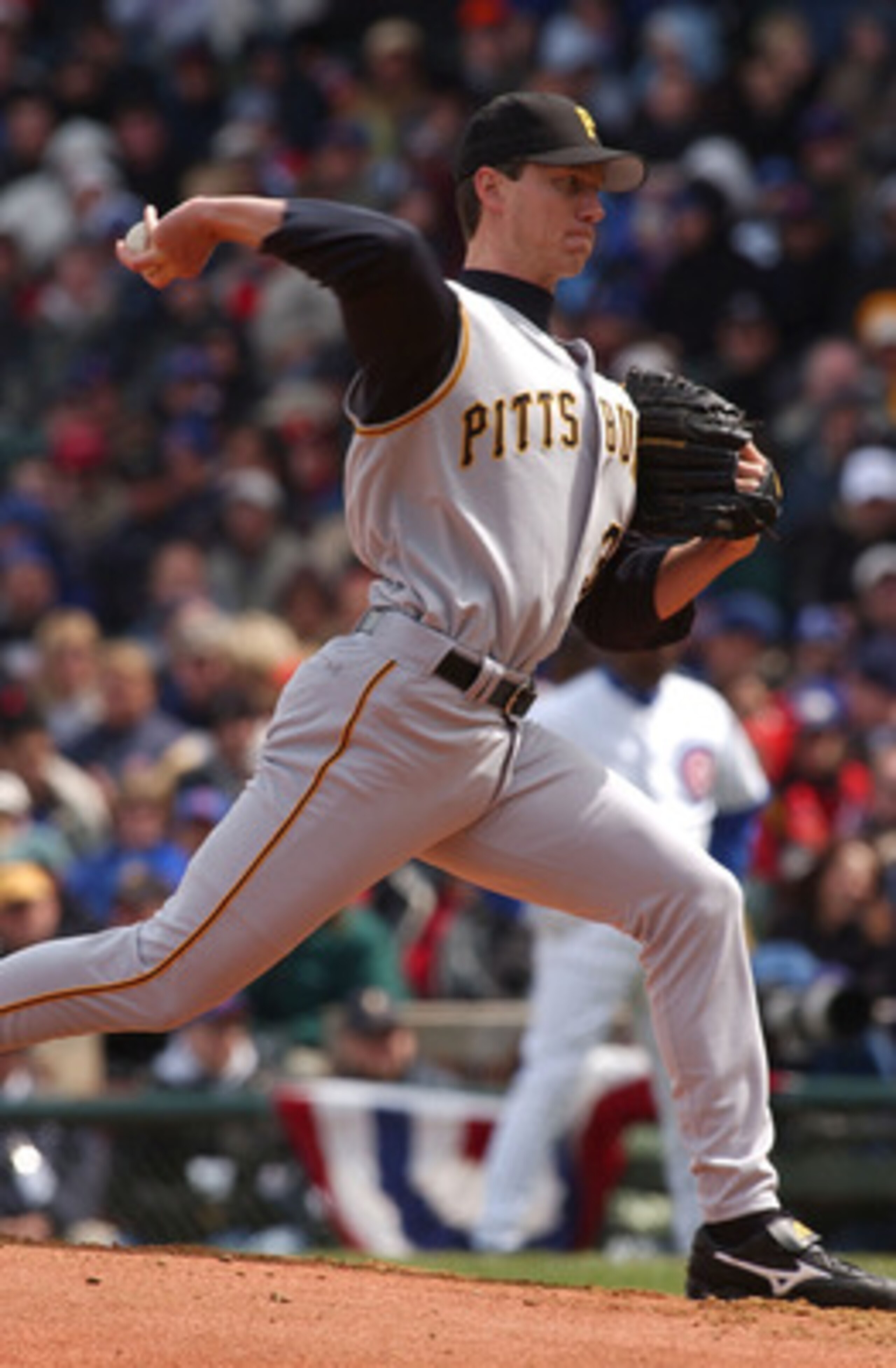 CHICAGO - APRIL 12:  Starting pitcher Kris Benson #34 of the Pittsburgh Pirates delivers the ball to the Chicago Cubs on April 12, 2004 at Wrigley Field in Chicago, Illinois. The Pirates defeated the Cubs 13-2.  (Photo by Jonathan Daniel/Getty Images)