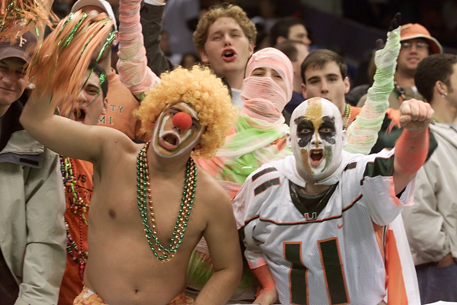 2 Jan 2001: Fans of the Miami Hurricanes hoop it up against the Florida Gators before the Sugar Bowl at the Superdome in New Orleans, Lousiana. < DIGITAL IMAGE> Mandatory Credit: Brian Bahr/ALLSPORT 2 Jan 2001: Fans of the Miami Hurricanes hoop it up against the Florida Gators before the Sugar Bowl at the Superdome in New Orleans, Lousiana. < DIGITAL IMAGE> Mandatory Credit: Brian Bahr/ALLSPORT