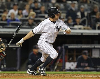 NEW YORK, NY - MAY 13:  Brett Gardner #11 of the New York Yankees gets a hits against the Boston Red Sox during their game on May 13, 2011 at Yankee Stadium in the Bronx borough of New York City.  (Photo by Al Bello/Getty Images)