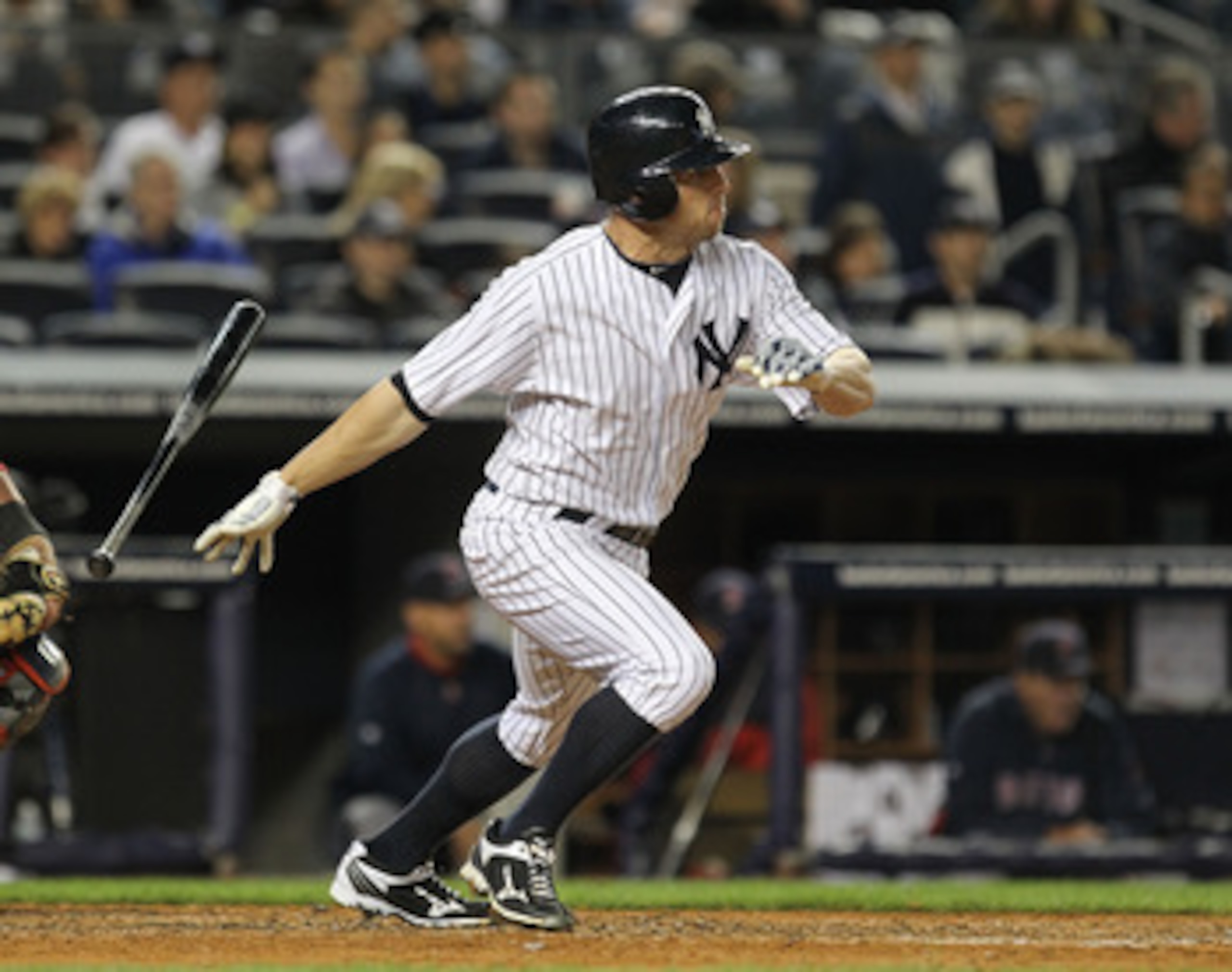 NEW YORK, NY - MAY 13:  Brett Gardner #11 of the New York Yankees gets a hits against the Boston Red Sox during their game on May 13, 2011 at Yankee Stadium in the Bronx borough of New York City.  (Photo by Al Bello/Getty Images)