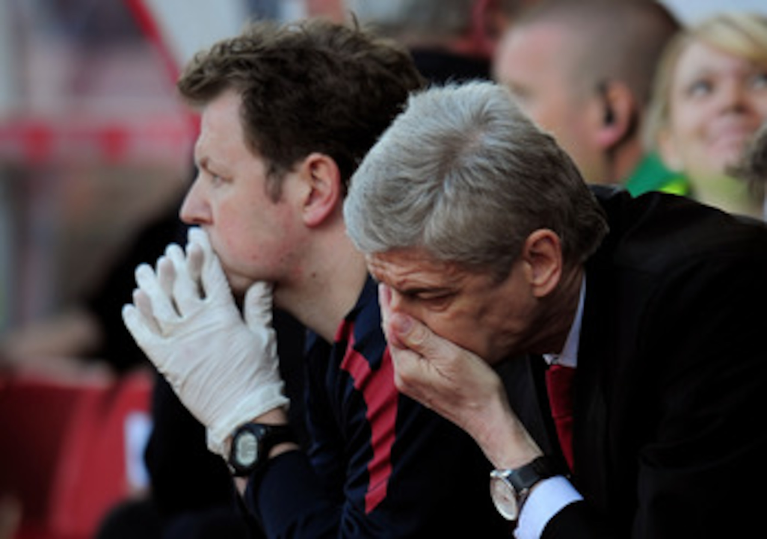 STOKE ON TRENT, ENGLAND - MAY 08:  A dejected Arsene Wenger the Arsenal manager holds his head in his hands as his team head towards a 3-1 defeat during the Barclays Premier League match between Stoke City and Arsenal at the Britannia Stadium on May 8, 20
