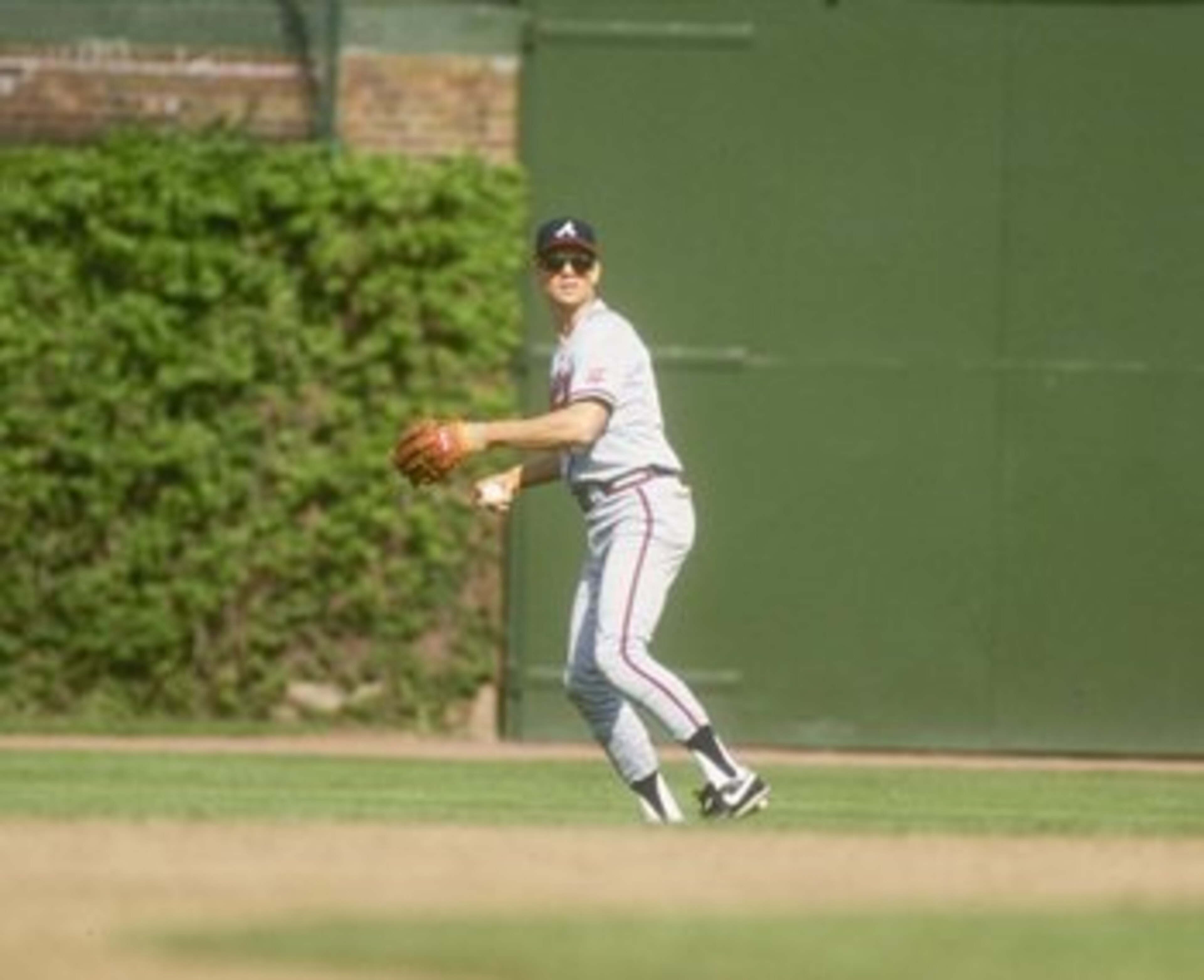 Outfielder Dale Murphy of the Atlanta Braves in action in the outfield.