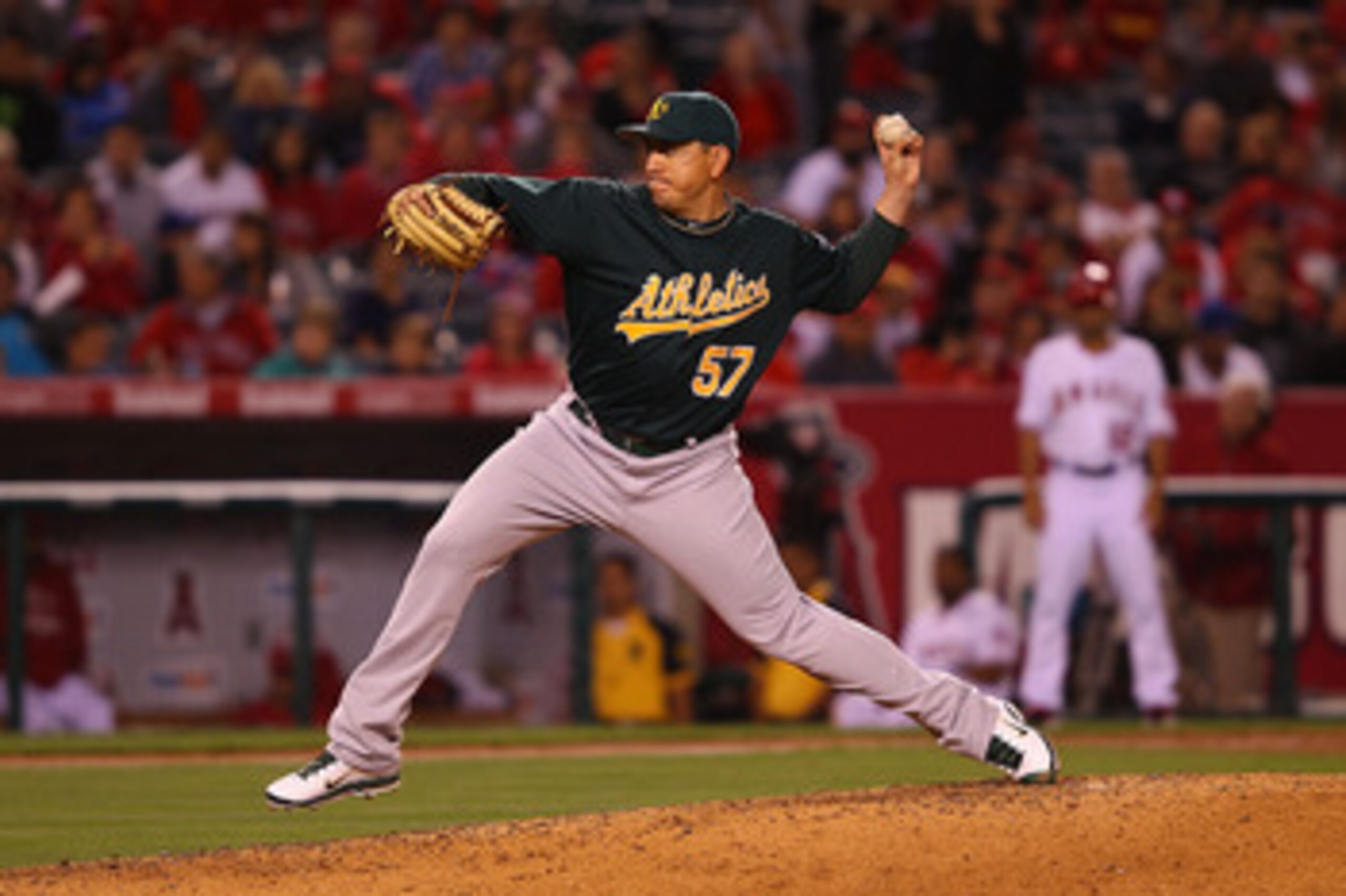 ANAHEIM, CA - MAY 23:  Brian Fuentes #57 of the Oakland Athletics pitches against the Los Angeles Angeles of Anaheim in the eighth inning at Angel Stadium on May 23, 2011 in Anaheim, California.  (Photo by Joe Scarnici/Getty Images)