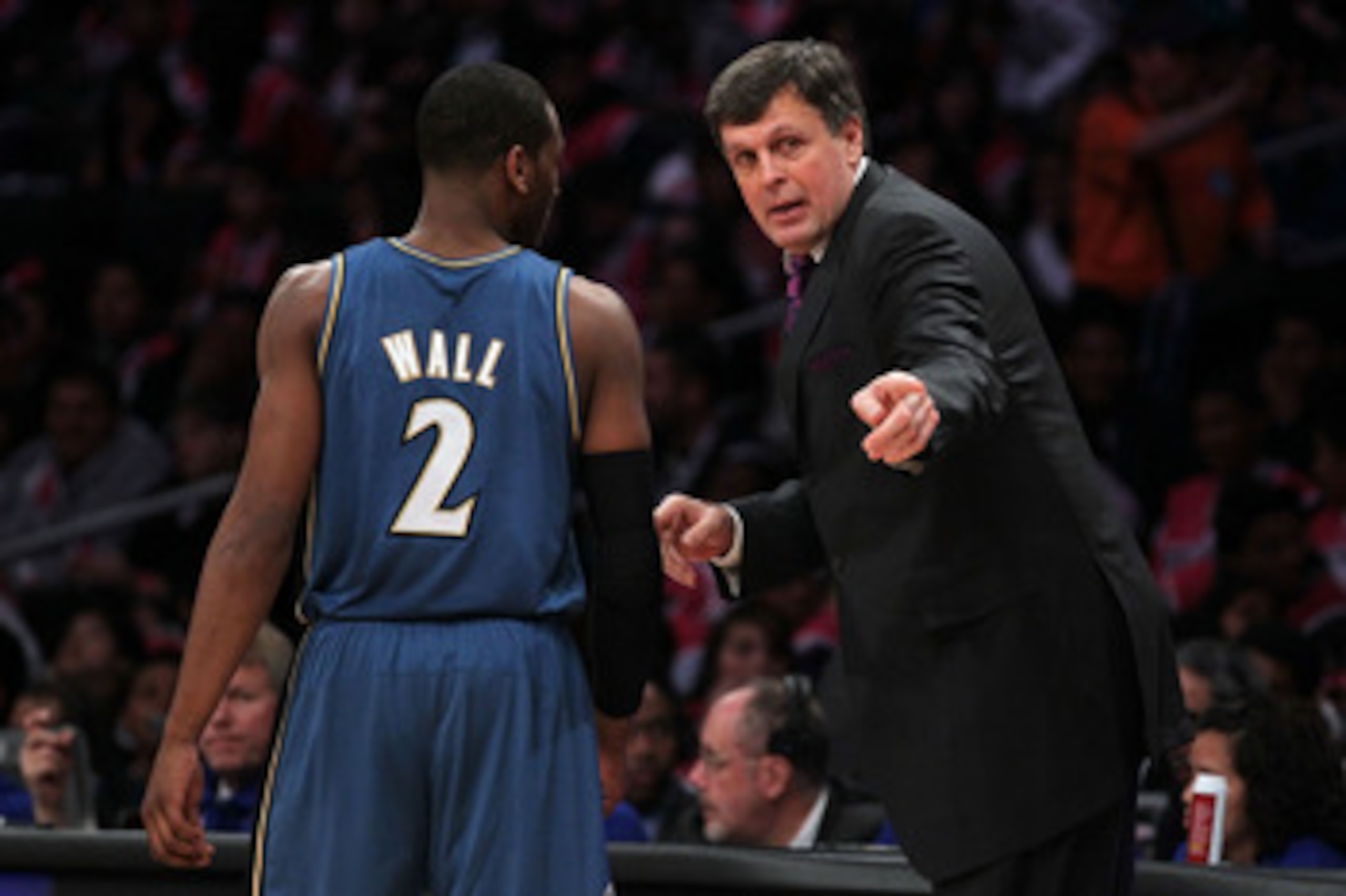 LOS ANGELES, CA - FEBRUARY 18:  Assistant coach Kevin McHale of the Rookie Team talks with John Wall #2 of the Washington Wizards and the Rookie Team in the first half during the T-Mobile Rookie Challenge and Youth Jam at Staples Center on February 18, 20