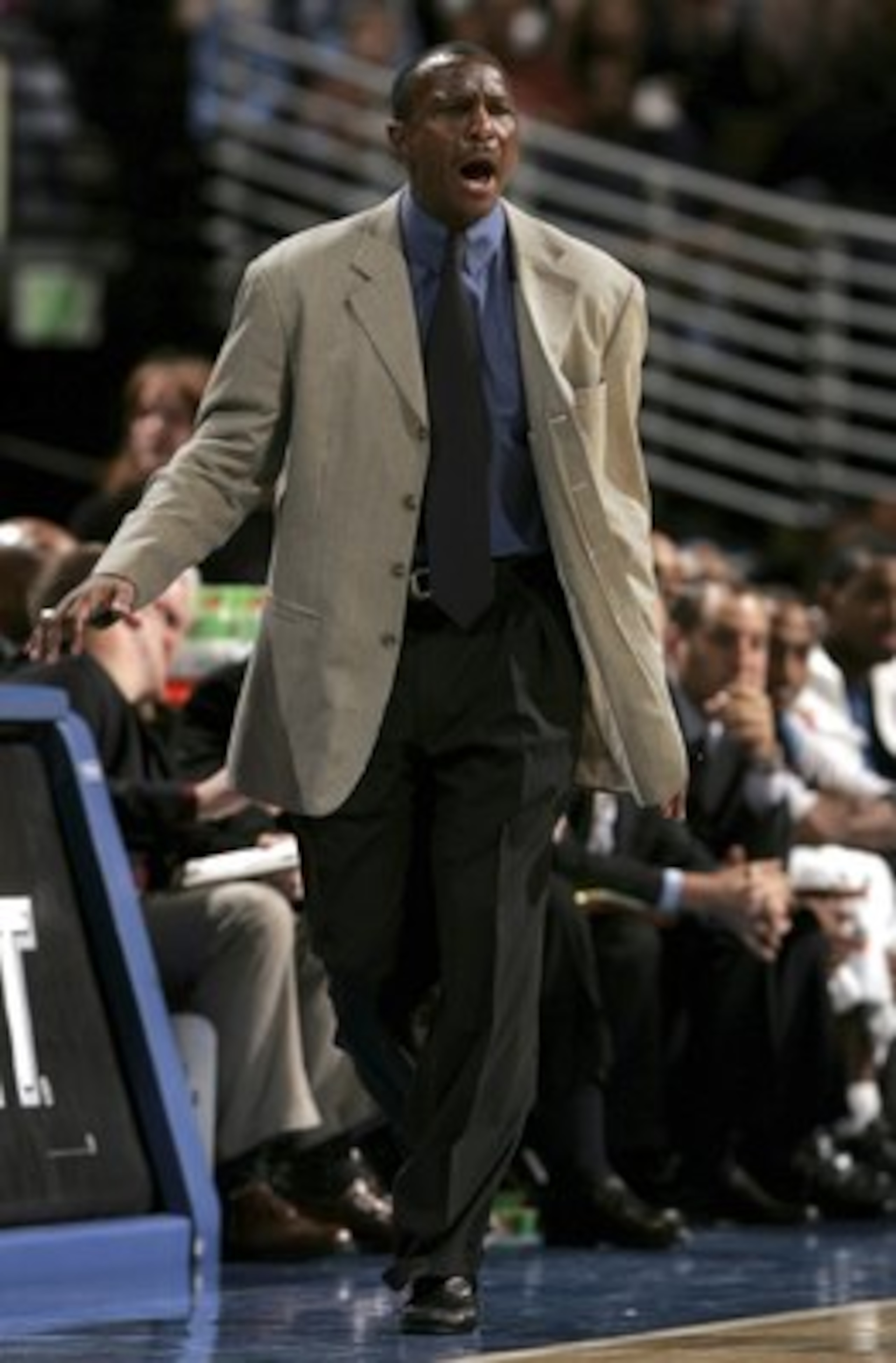 DENVER - NOVEMBER 03:  Head coach Dwane Casey of the Minnesota Timberwolves directs his team as they defeated the Denver Nuggets 112-109 on November 3, 2006 at the Pepsi Center in Denver, Colorado. NOTE TO USER: User expressly acknowledges and agrees that