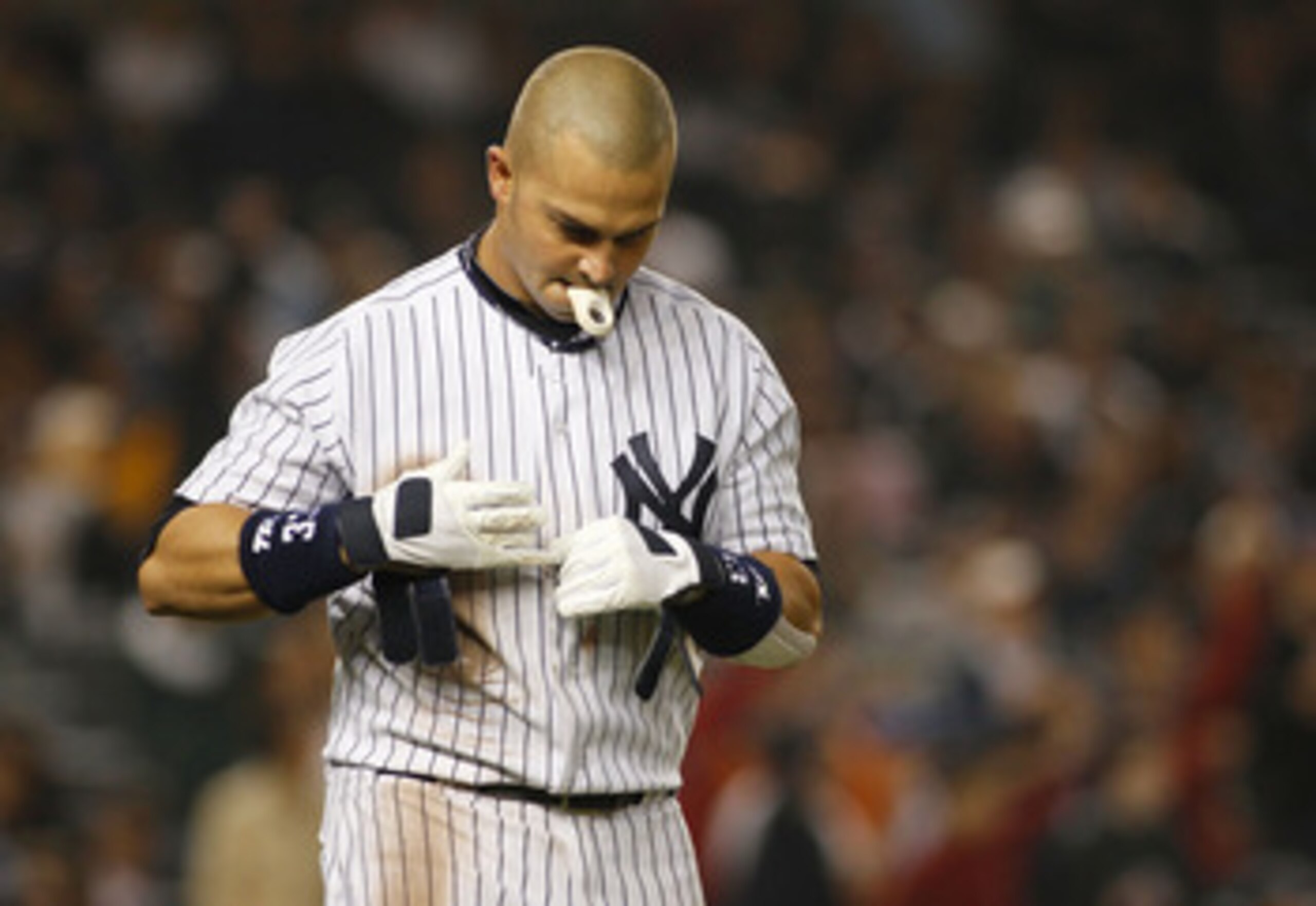 NEW YORK - MAY 20:  Nick Swisher #33 of the New York Yankees reacts after striking out against the New York Mets on May 20, 2011 at Yankee Stadium in the Bronx borough of New York City.  Mets defeat the Yankees 2-1.  (Photo by Mike Stobe/Getty Images)