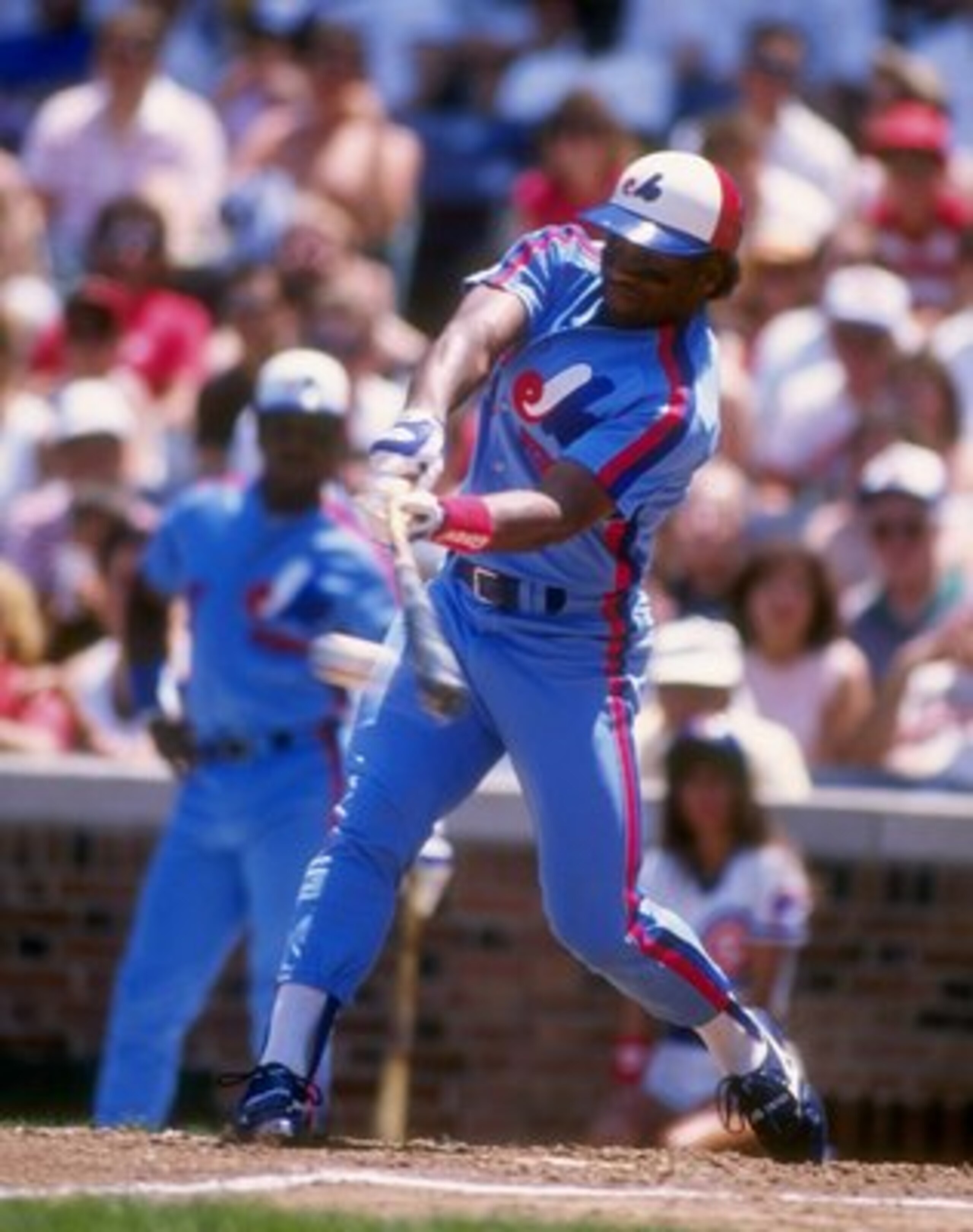 Sep 1988: Infielder Tim Raines of the Montreal Expos swings at the ball during a game against the Chicago Cubs at Wrigley Field in Chicago, Illinois. Mandatory Credit: Jonathan Daniel /Allsport Sep 1988: Infielder Tim Raines of the Montreal Expos swings at the ball during a game against the Chicago Cubs at Wrigley Field in Chicago, Illinois. Mandatory Credit: Jonathan Daniel /Allsport