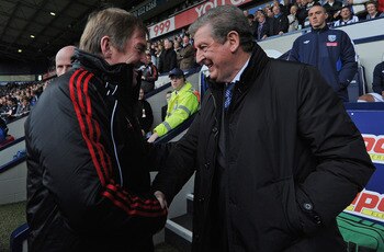 WEST BROMWICH, ENGLAND - APRIL 02: Liverpool manager Kenny Dalglish and West Brom manager Roy Hodgson shake hands before the Barclays Premier League match between West Bromwich Albion and Liverpool at The Hawthorns on April 2, 2011 in West Bromwich, Engla