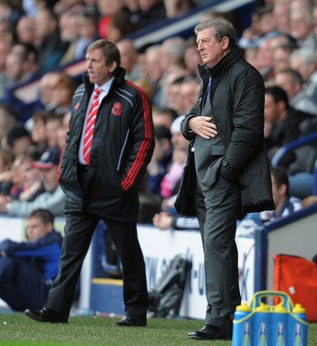 WEST BROMWICH, ENGLAND - APRIL 02:  Liverpool manager Kenny Dalglish and West Brom manager Roy Hodgson look on during the Barclays Premier League match between West Bromwich Albion and Liverpool at The Hawthorns on April 2, 2011 in West Bromwich, England.