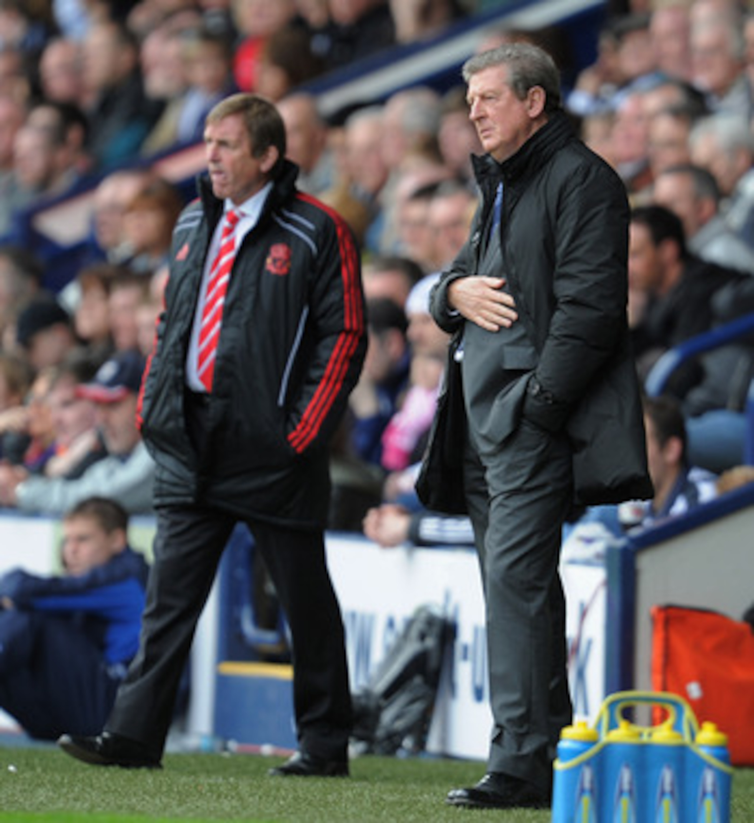 WEST BROMWICH, ENGLAND - APRIL 02:  Liverpool manager Kenny Dalglish and West Brom manager Roy Hodgson look on during the Barclays Premier League match between West Bromwich Albion and Liverpool at The Hawthorns on April 2, 2011 in West Bromwich, England.
