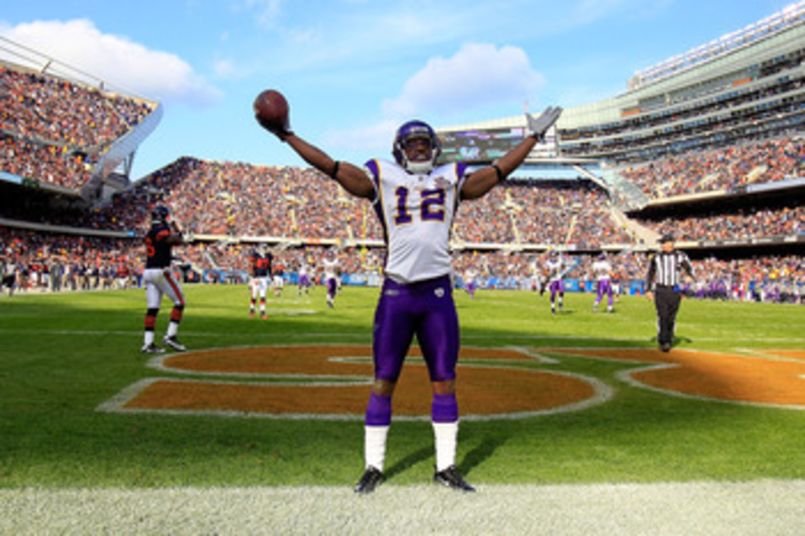 CHICAGO - NOVEMBER 14: Percey Harvin #12 of the Minnesota Vikings celebrates a touchdown catch against the Chicago Bears at Soldier Field on November 14, 2010 in Chicago, Illinois. The Bears defeated the Vikings 27-13. (Photo by Jonathan Daniel/Getty Imag