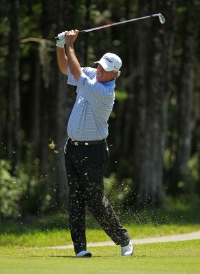 LUTZ, FL - APRIL 17:  Russ Cochran hits his approach shot on the 12th hole during the final round of the Outback Steakhouse Pro-Am at the TPC of Tampa on April 17, 2011 in Lutz, Florida.  (Photo by Mike Ehrmann/Getty Images)