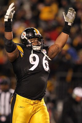 PITTSBURGH, PA - JANUARY 23:  Ziggy Hood #96 of the Pittsburgh Steelers celebrates William Gay's second quarter touchdown scored after Mark Sanchez #6 of the New York Jets fumbled during the 2011 AFC Championship game at Heinz Field on January 23, 2011 in