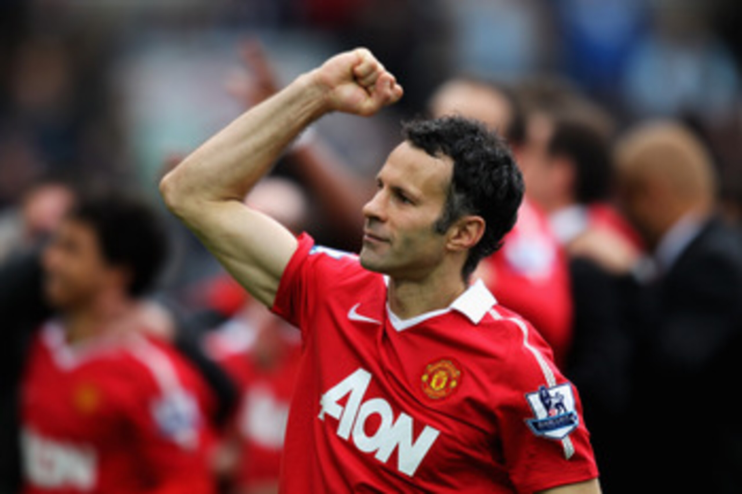 BLACKBURN, ENGLAND - MAY 14:  Ryan Giggs of Manchester United pumps his fist to the fans after drawing the Barclays Premier League match between Blackburn Rovers and Manchester United but winning the title at Ewood park on May 14, 2011 in Blackburn, Engla