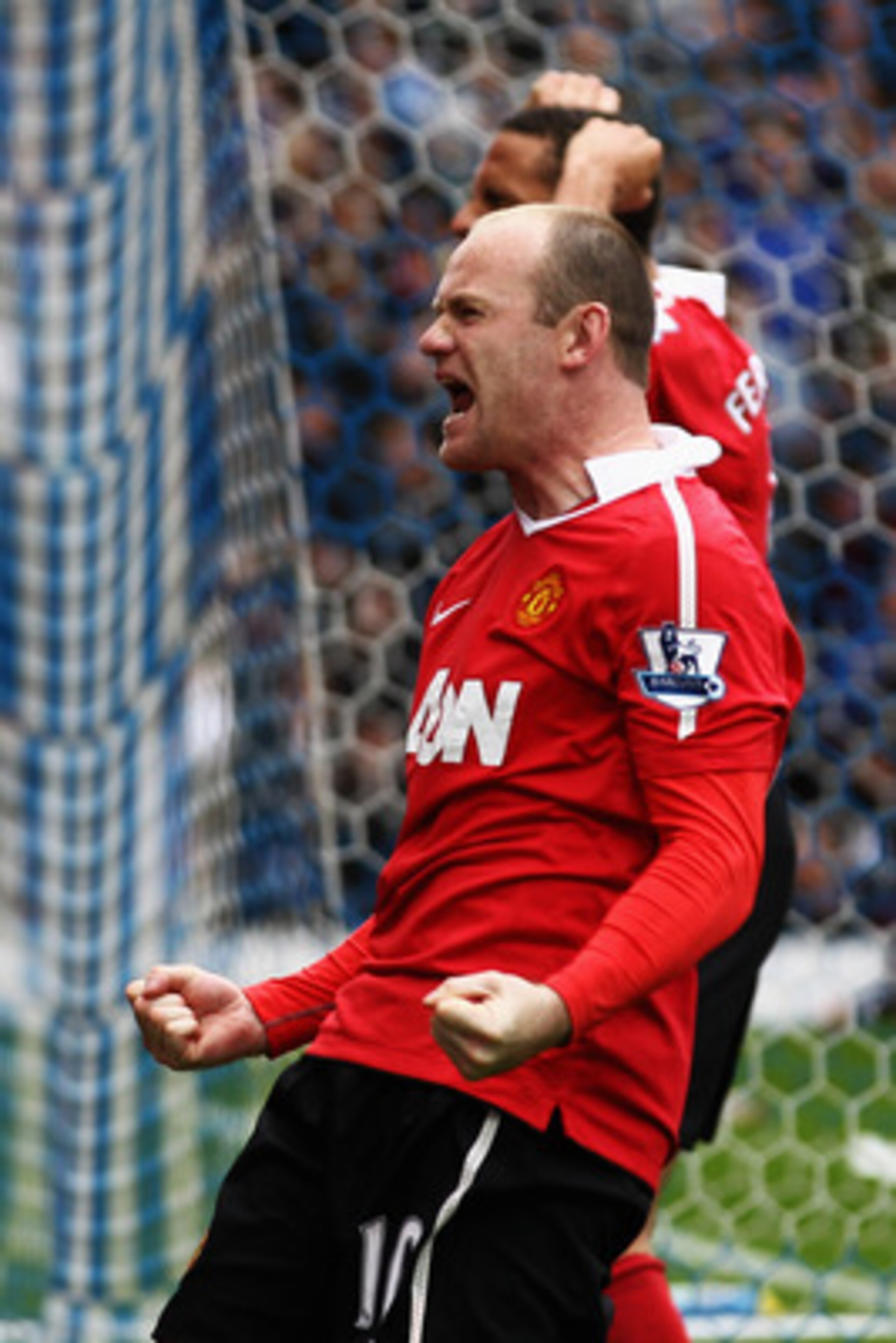 BLACKBURN, ENGLAND - MAY 14:  Wayne Rooney of Manchester United celebrates after scoring a penalty during the Barclays Premier League match between Blackburn Rovers and Manchester United at Ewood park on May 14, 2011 in Blackburn, England.  (Photo by Dean