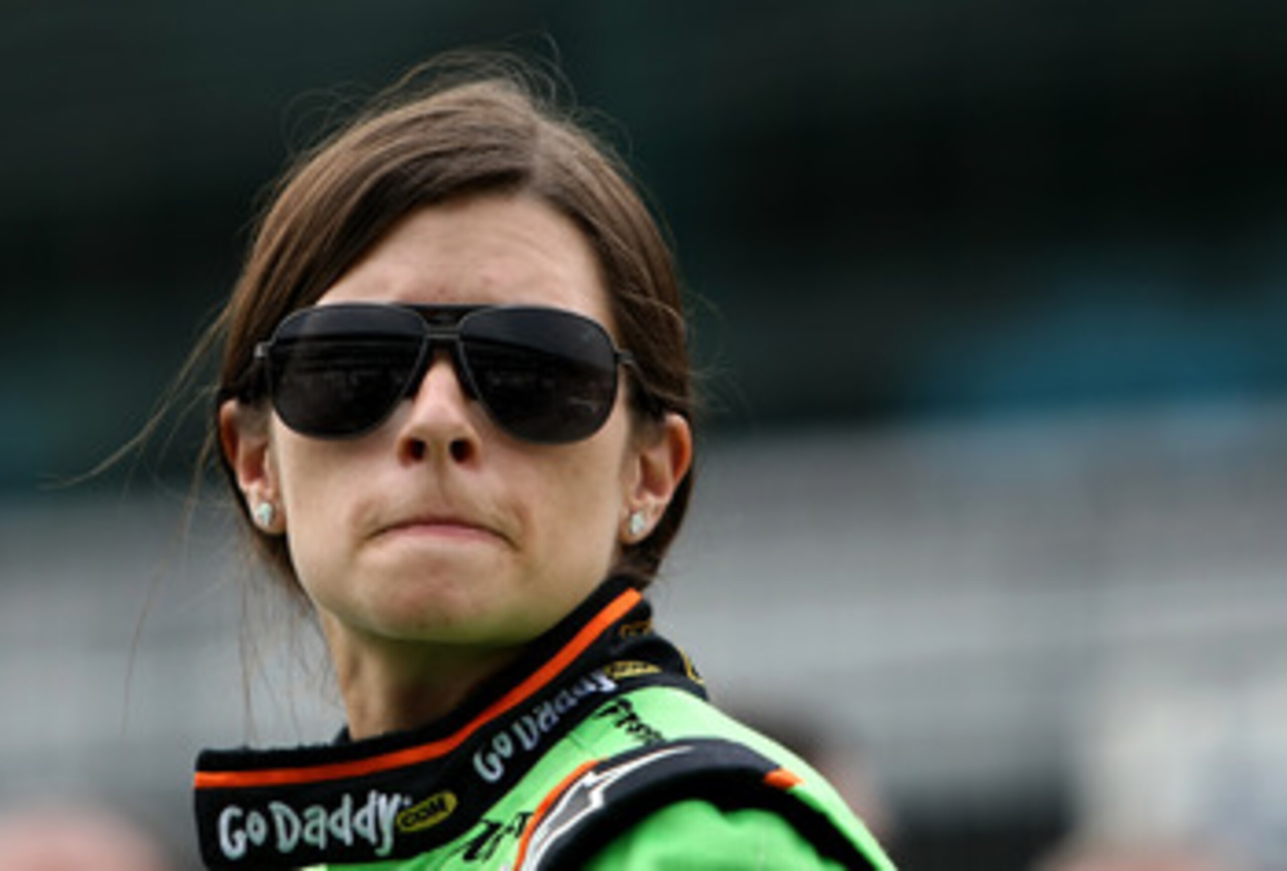 INDIANAPOLIS - MAY 22:  Danica Patrick waits to drive her #7 Team GoDaddy Andretti Autosport Dallara Honda during qualifying for the the 95th Indianapolis 500 Mile Race at the Indianapolis Motor Speedway on May 22, 2011 in Indianapolis, Indiana.  (Photo b