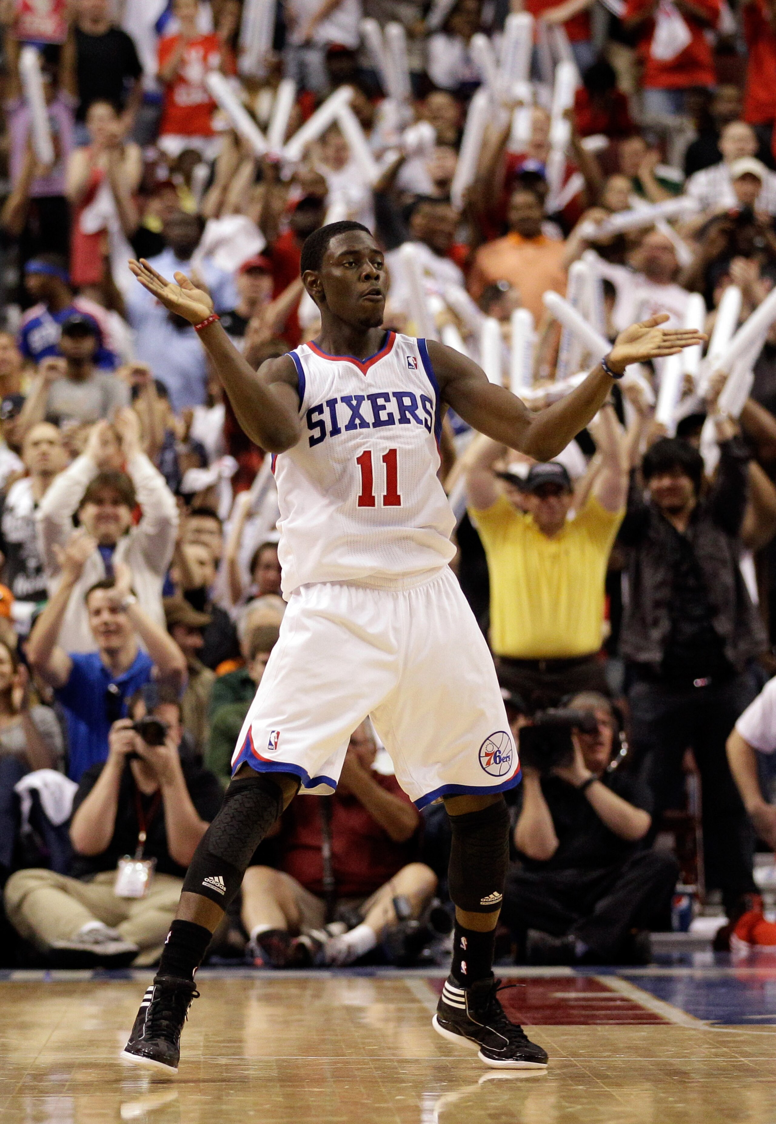 PHILADELPHIA, PA - APRIL 24: Jrue Holiday #11 of the Philadelphia 76ers celebrates after scoring against the Miami Heat in the fourth quarter of Game Four of the Eastern Conference Quarterfinals in the 2011 NBA Playoffs at Wells Fargo Center on April 24,