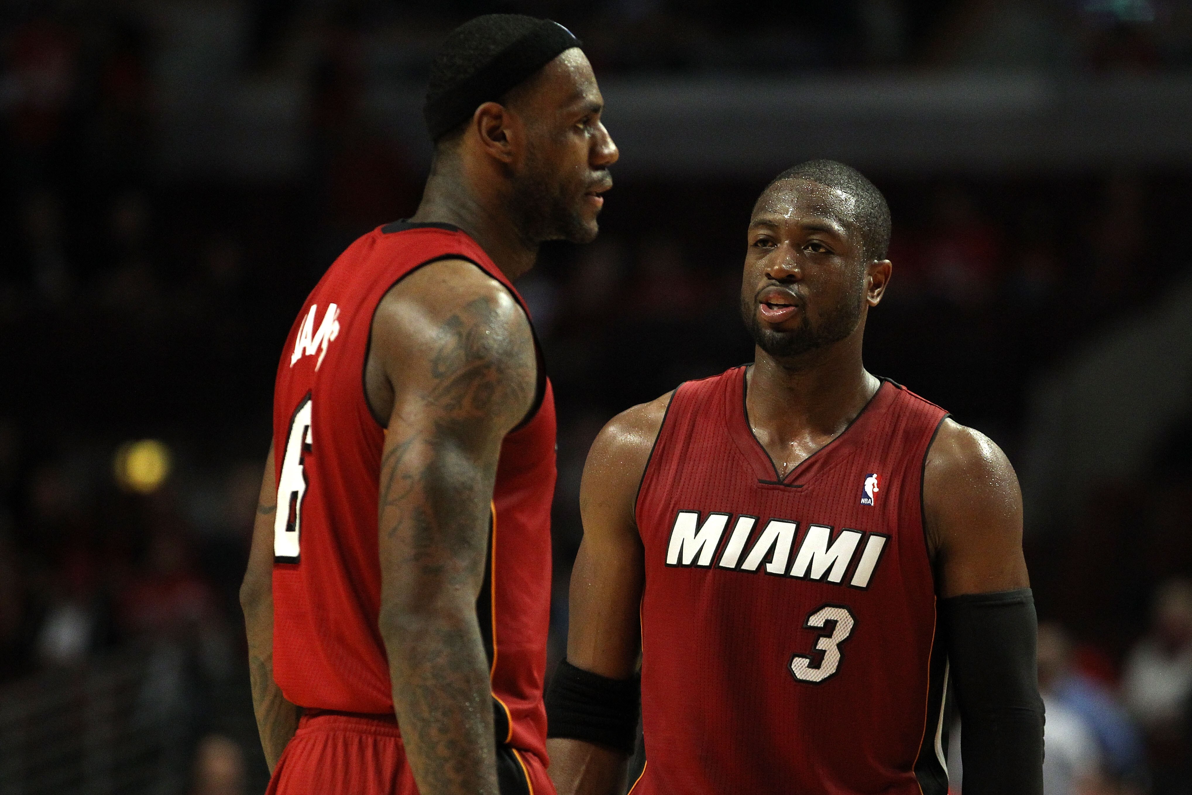 CHICAGO, IL - MAY 18: Dwyane Wade #3 and LeBron James #6 of the Miami Heat look on against the Chicago Bulls in Game Two of the Eastern Conference Finals during the 2011 NBA Playoffs on May 18, 2011 at the United Center in Chicago, Illinois. The Heat won CHICAGO, IL - MAY 18: Dwyane Wade #3 and LeBron James #6 of the Miami Heat look on against the Chicago Bulls in Game Two of the Eastern Conference Finals during the 2011 NBA Playoffs on May 18, 2011 at the United Center in Chicago, Illinois. The Heat won