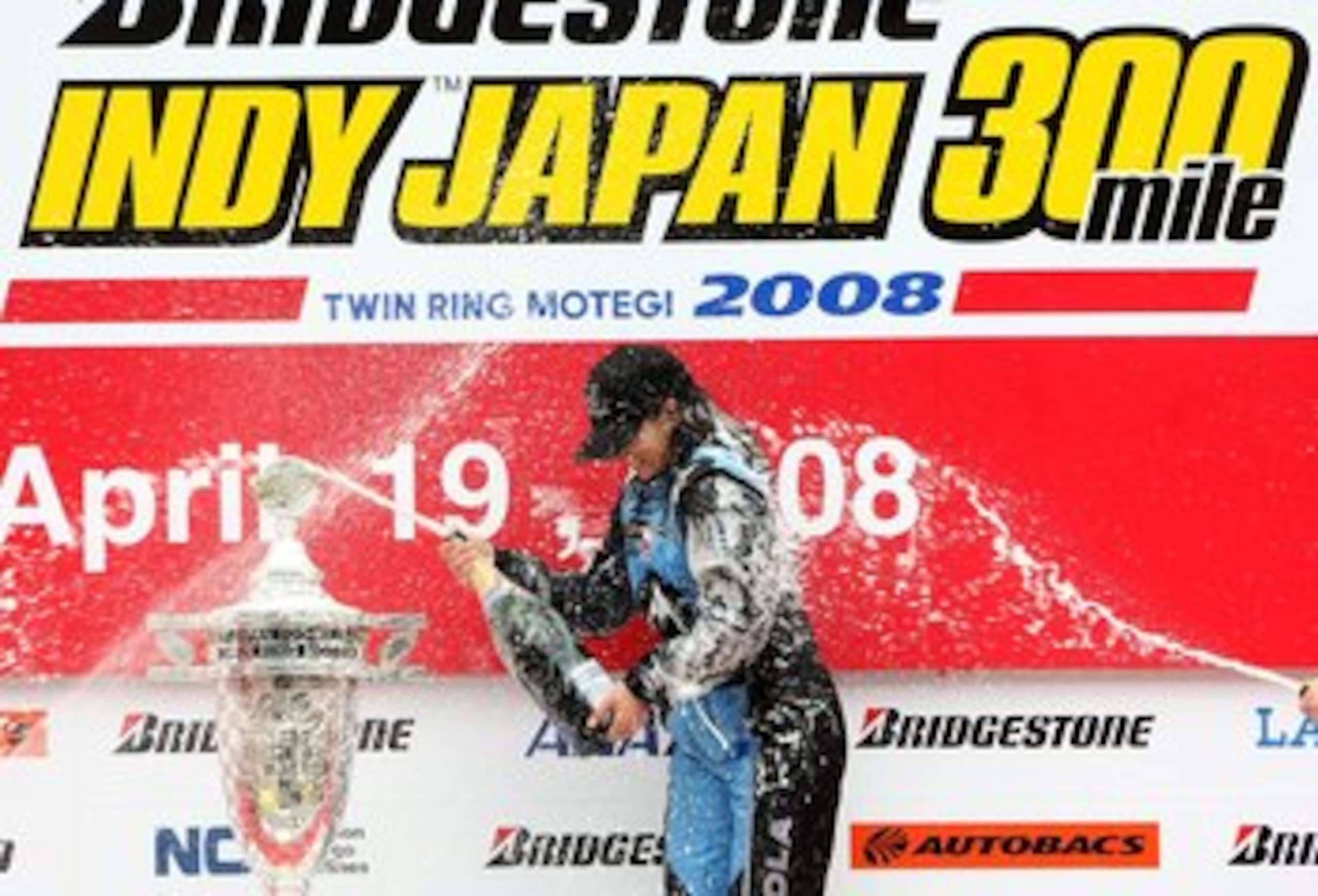 MOTEGI, JAPAN - APRIL 20:  Danica Patrick driver of the #7 Motorola Andretti Green Racing Honda Dallara sprays champagne after winning the IndyCar Series Bridgestone Indy Japan 300 Mile on April 20, 2008 at Twin Ring Motegi in Motegi, Japan.  (Photo by Jo