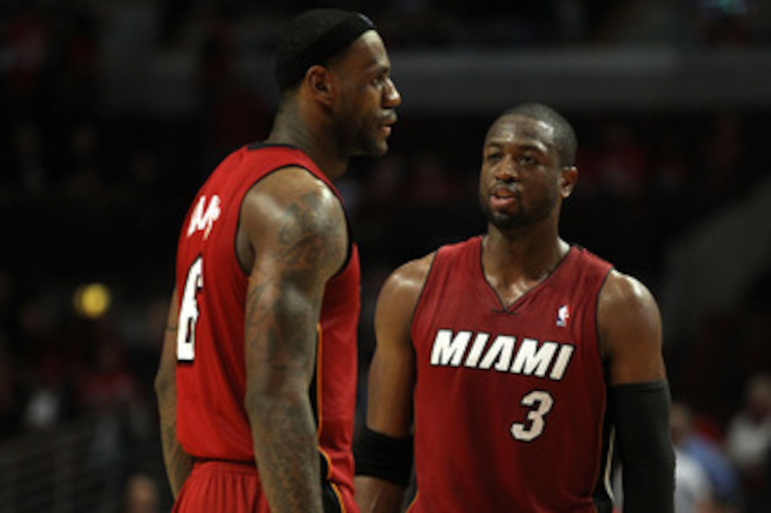 CHICAGO, IL - MAY 18:  Dwyane Wade #3 and LeBron James #6 of the Miami Heat look on against the Chicago Bulls in Game Two of the Eastern Conference Finals during the 2011 NBA Playoffs on May 18, 2011 at the United Center in Chicago, Illinois. The Heat won