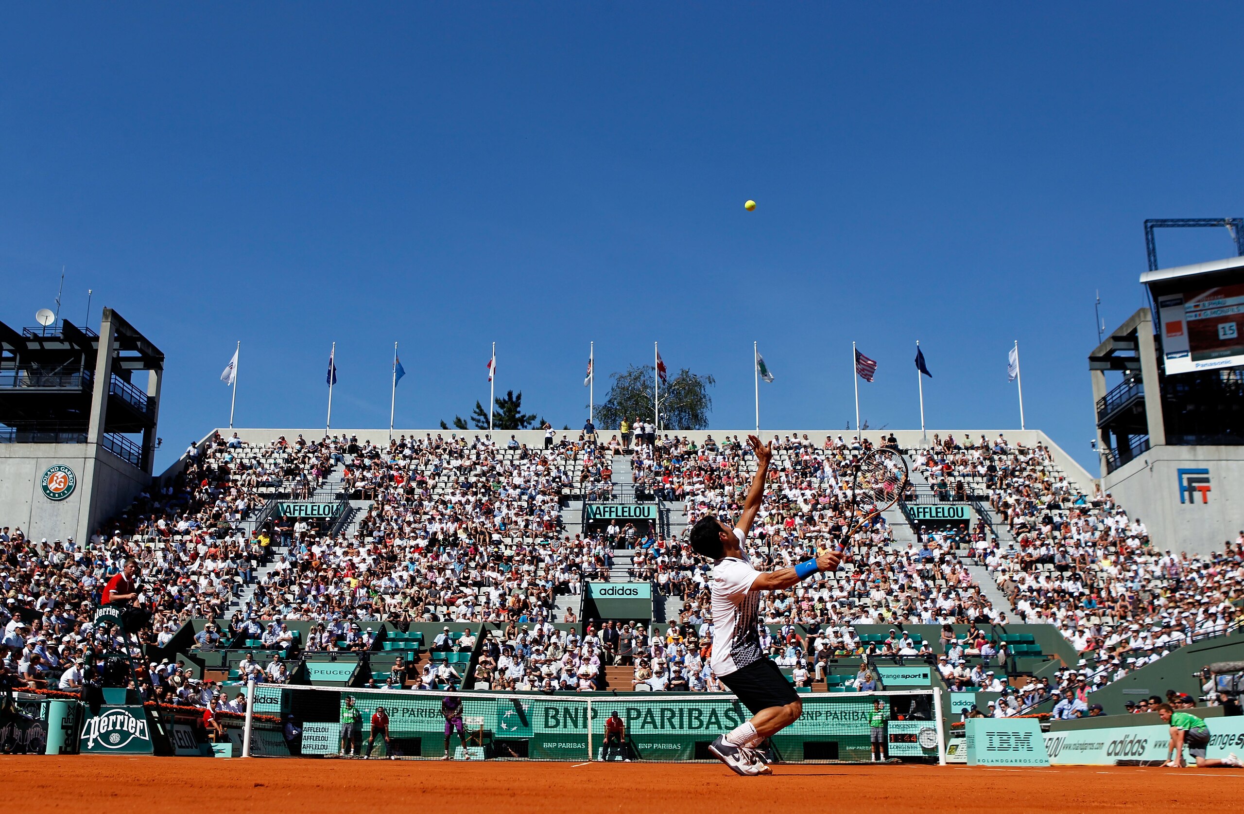 PARIS, FRANCE - MAY 23:  Bjorn Phau of Germany serves during the men's singles first round match between Bjorn Phau of Germany and Gael Monfils of France on day two of the French Open at Roland Garros on May 23, 2011 in Paris, France.  (Photo by Matthew S