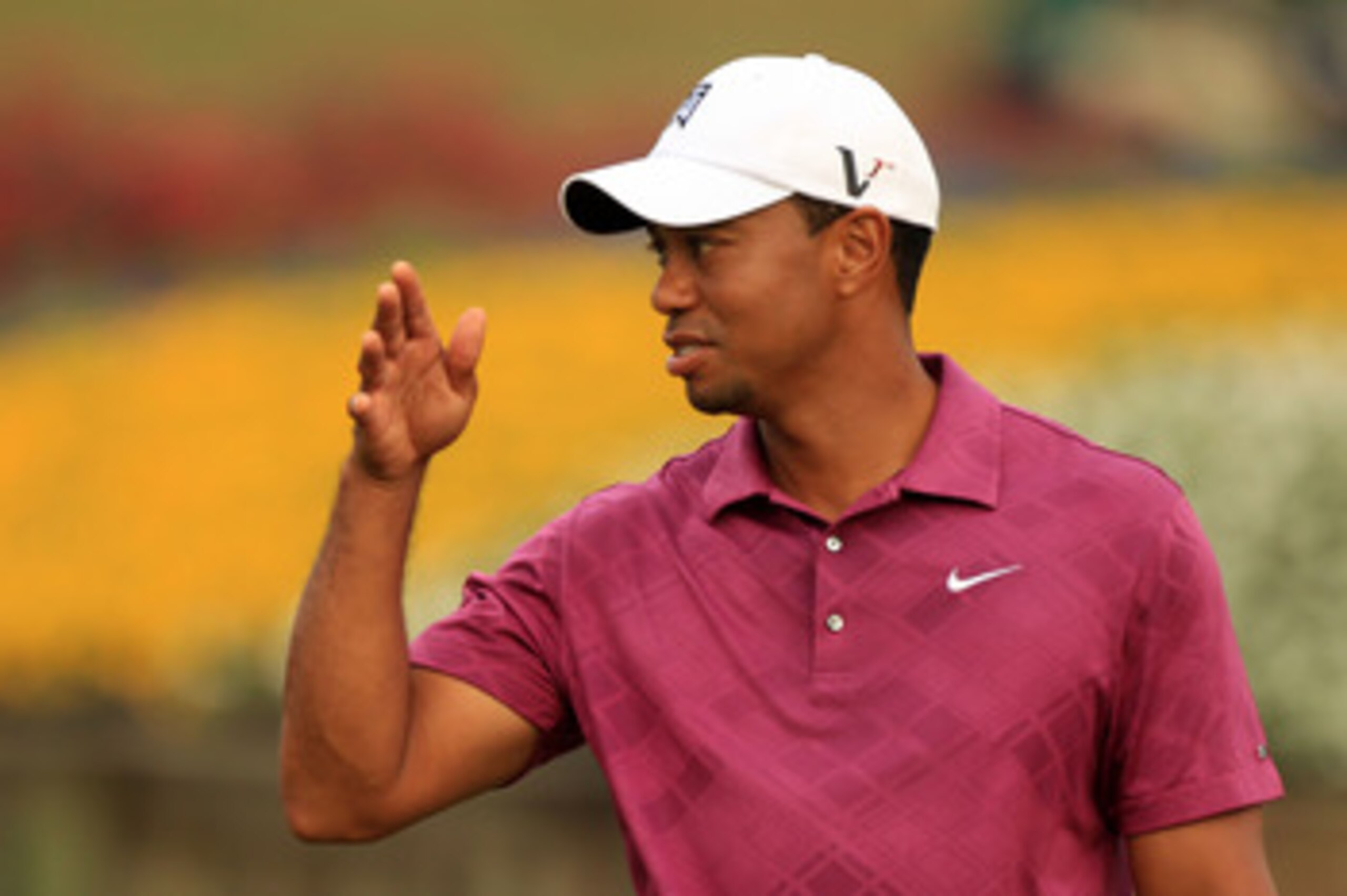 PONTE VEDRA BEACH, FL - MAY 11: Tiger Woods reacts during a practice round prior to the start of THE PLAYERS Championship held at THE PLAYERS Stadium course at TPC Sawgrass on May 11, 2011 in Ponte Vedra Beach, Florida. (Photo by Streeter Lecka/Getty Im PONTE VEDRA BEACH, FL - MAY 11: Tiger Woods reacts during a practice round prior to the start of THE PLAYERS Championship held at THE PLAYERS Stadium course at TPC Sawgrass on May 11, 2011 in Ponte Vedra Beach, Florida. (Photo by Streeter Lecka/Getty Im