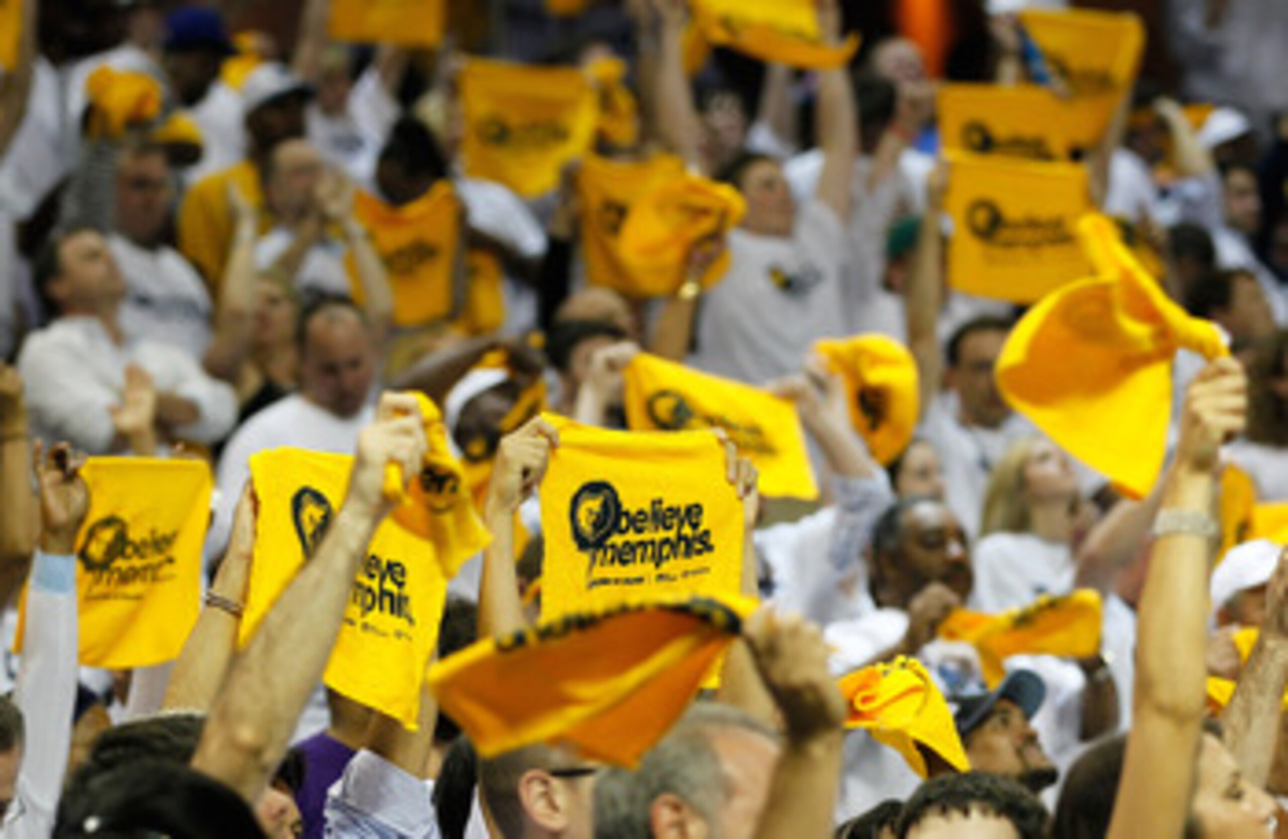 MEMPHIS, TN - MAY 13:  Memphis Grizzlies fans cheer against the Oklahoma City Thunder in Game Six of the Western Conference Semifinals in the 2011 NBA Playoffs at FedExForum on May 13, 2011 in Memphis, Tennessee.  NOTE TO USER: User expressly acknowledges