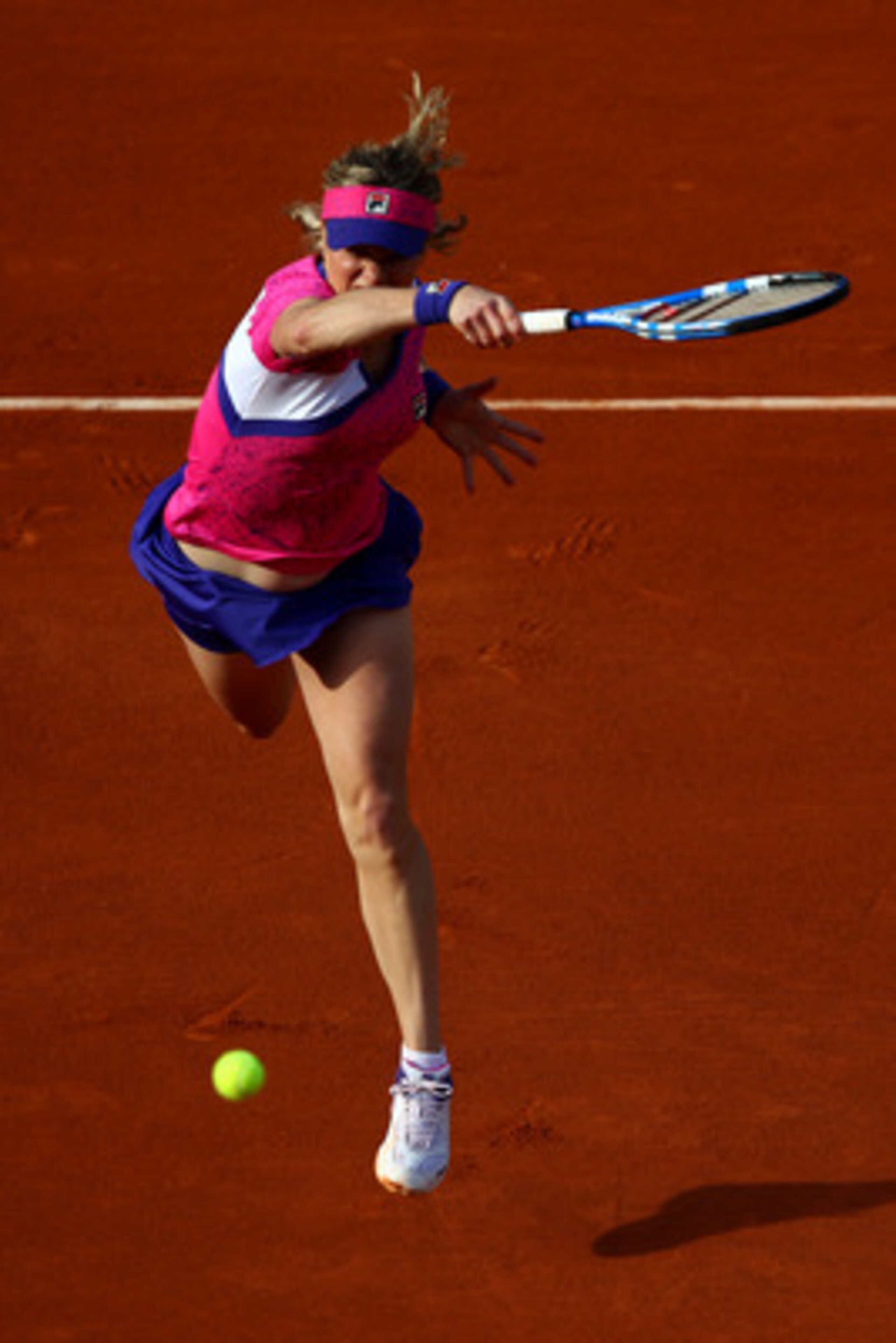 PARIS, FRANCE - MAY 24:  Kim Clijsters of Belgium hits a forehand during the women's singles round one match between Anastasiya Yakimova of Belarus and Kim Clijsters of Belgium on day three of the French Open at Roland Garros on May 24, 2011 in Paris, Fra