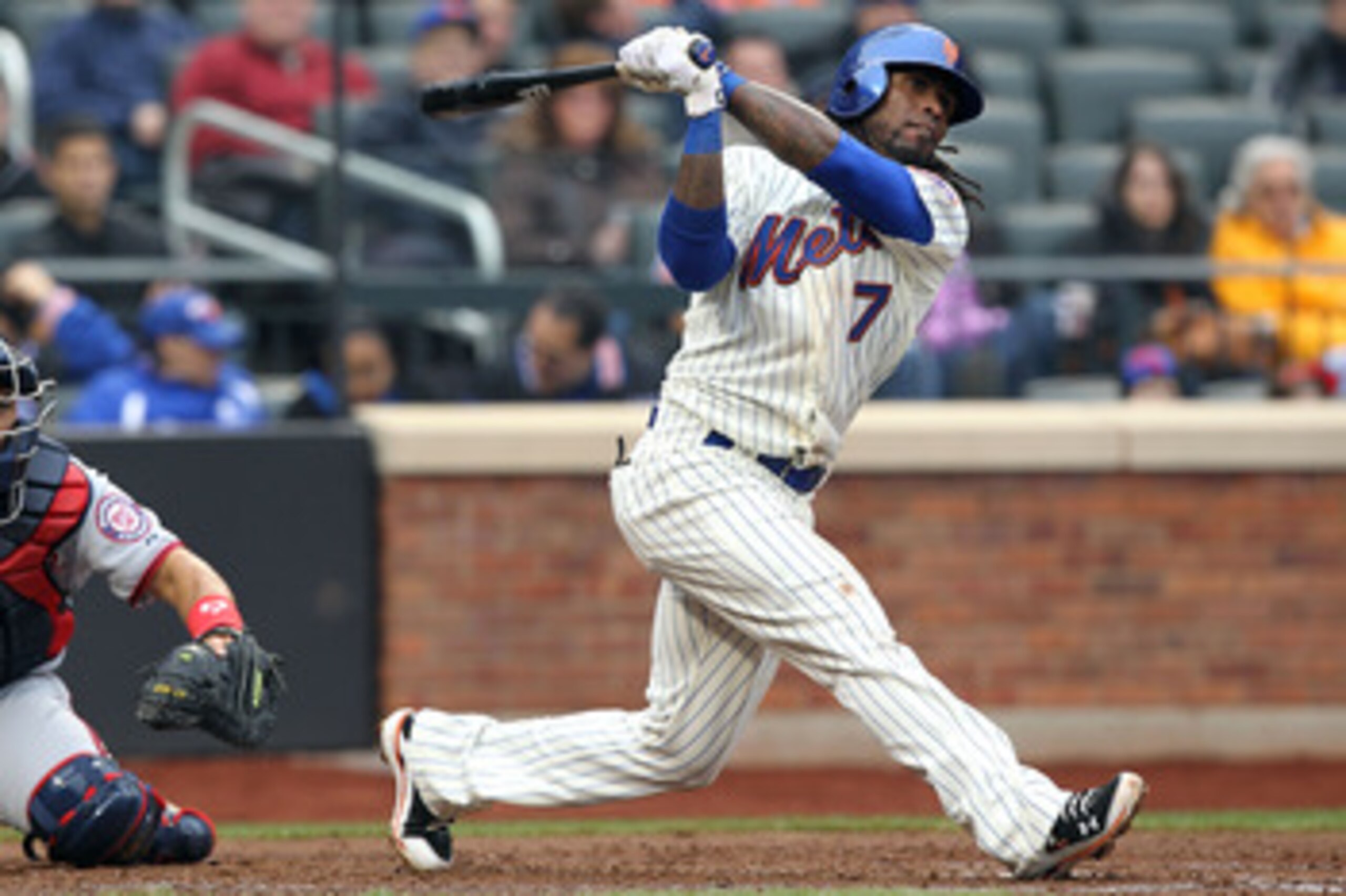 NEW YORK, NY - APRIL 08:  Jose Reyes #7 of the New York Mets bats against the Washington Nationals during the Mets' Home Opener at Citi Field on April 8, 2011 in the Flushing neighborhood of Queens in New York City. The Nationals won 6-2. (Photo by Al Bel