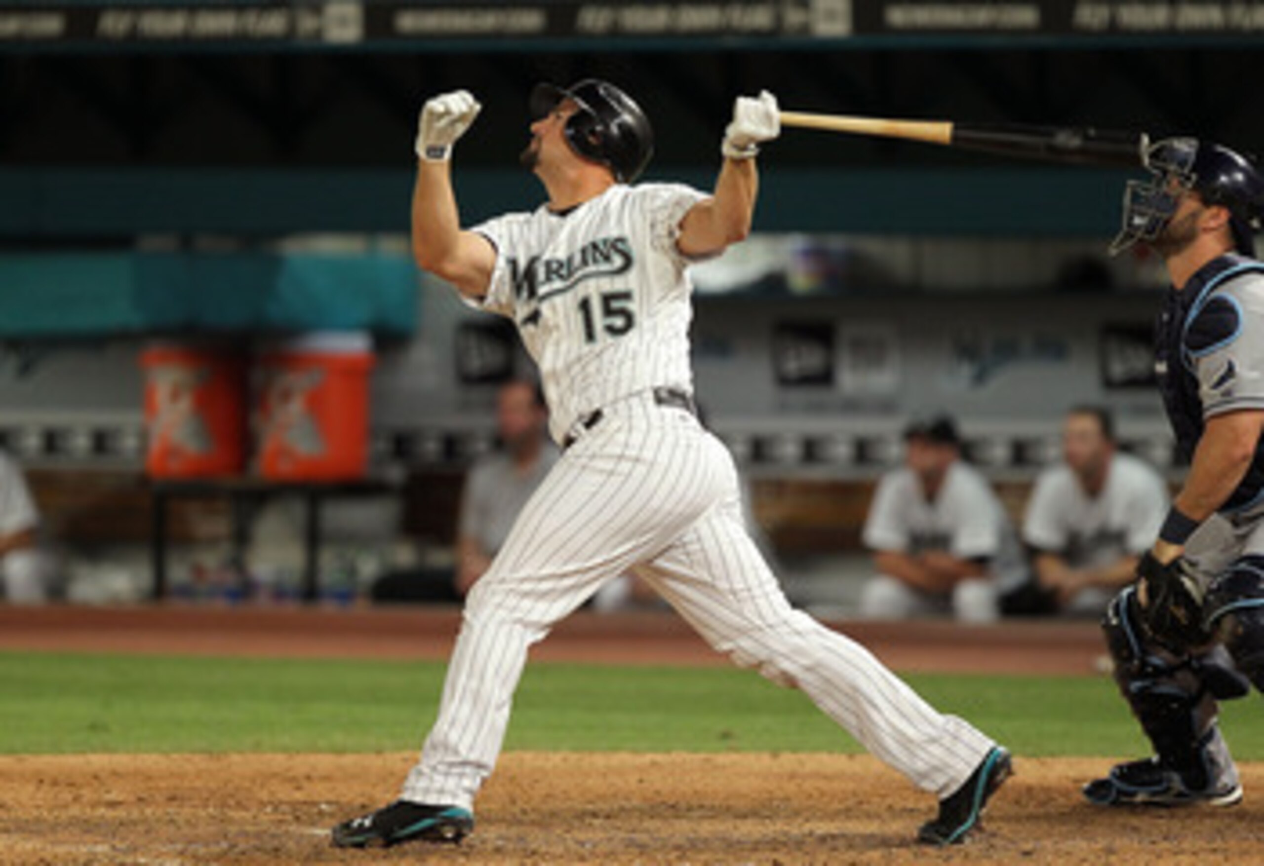 MIAMI GARDENS, FL - MAY 20:  Gaby Sanchez #15 of the Florida Marlins hits a sac fly during a game against the Tampa Bay Rays at Sun Life Stadium on May 20, 2011 in Miami Gardens, Florida.  (Photo by Mike Ehrmann/Getty Images)
