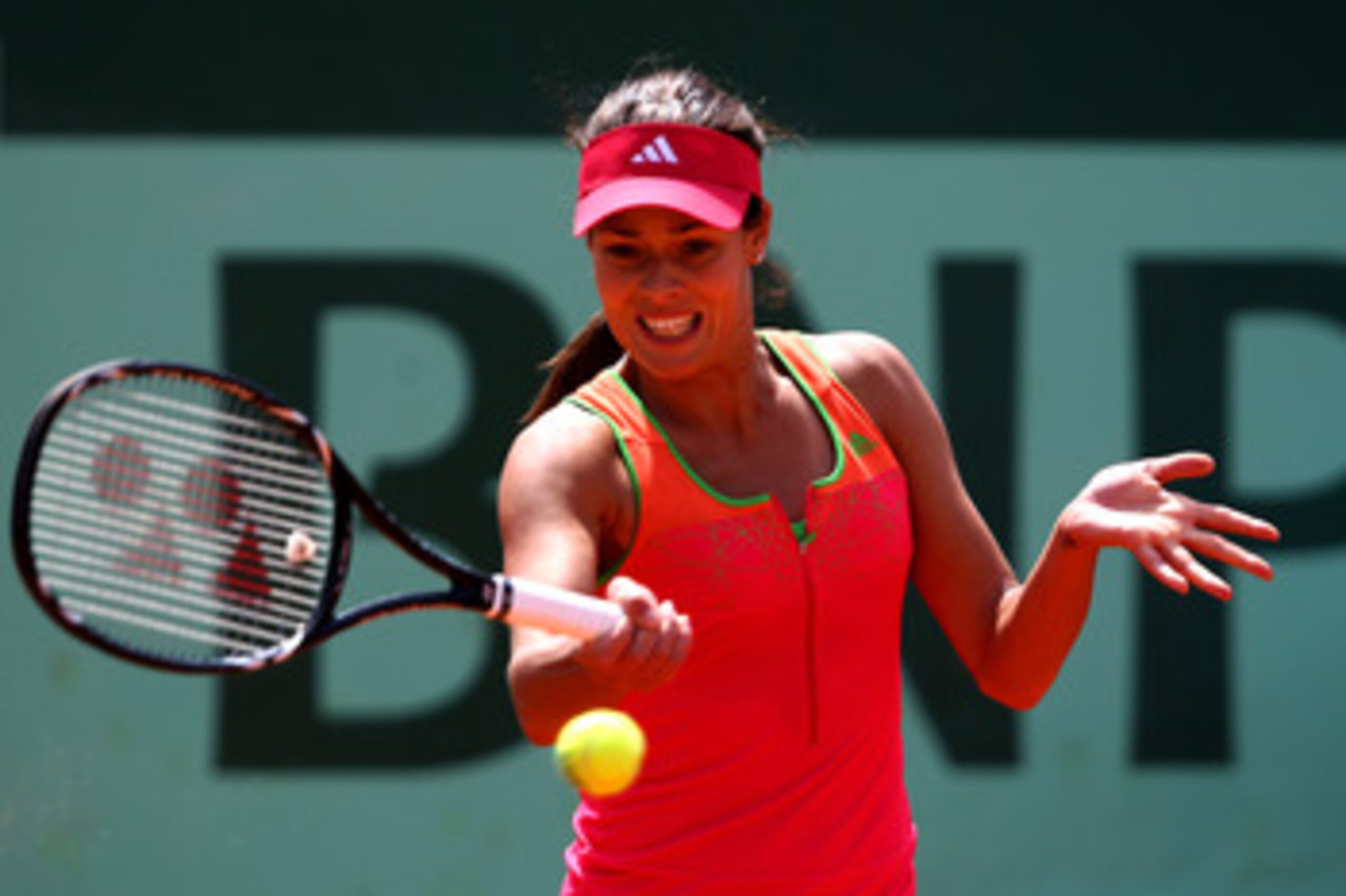 PARIS, FRANCE - MAY 24:  Ana Ivanovic of Serbia plays a forehand during the women's singles round one match between Johanna Larsson of Sweden and Ana Ivanovic of Serbia on day three of the French Open at Roland Garros on May 24, 2011 in Paris, France.  (P