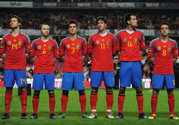 LISBON, PORTUGAL - NOVEMBER 17:  (L-R) Xabi Alonso, Andres Iniesta, David Villa, Joan Capdevila, Sergio Busquets and Xavi Hernandez of Spain look on prior to the International Friendly match between Portugal and Spain at the Estadio da Luz on November 17,