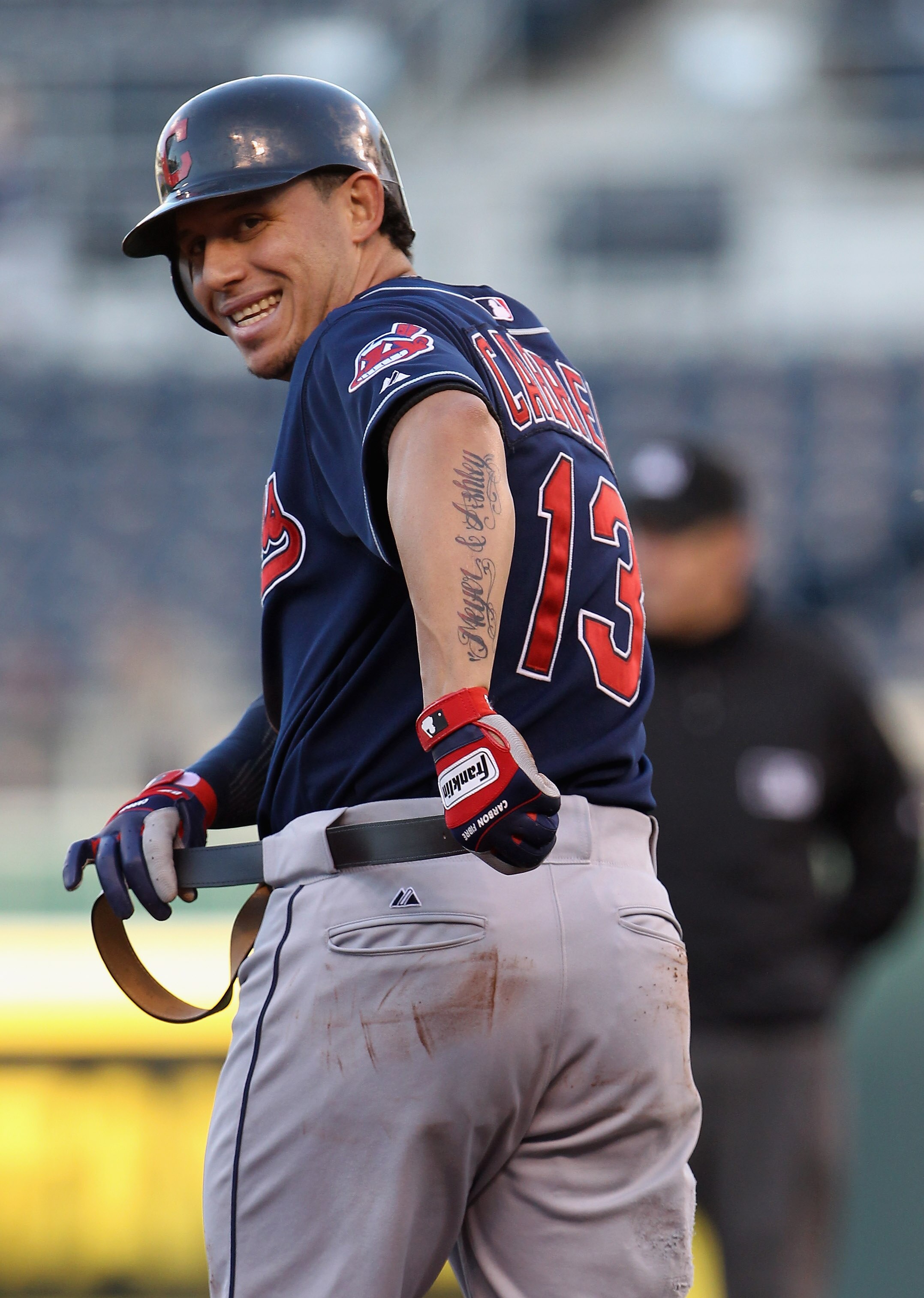 KANSAS CITY, MO - MAY 16:  Asdrubal Cabrera #13 of the Cleveland Indians replaces his belt after sliding into second base during the 1st inning of the game against the Kansas City Royals on May 16, 2011 at Kauffman Stadium in Kansas City, Missouri.  (Phot