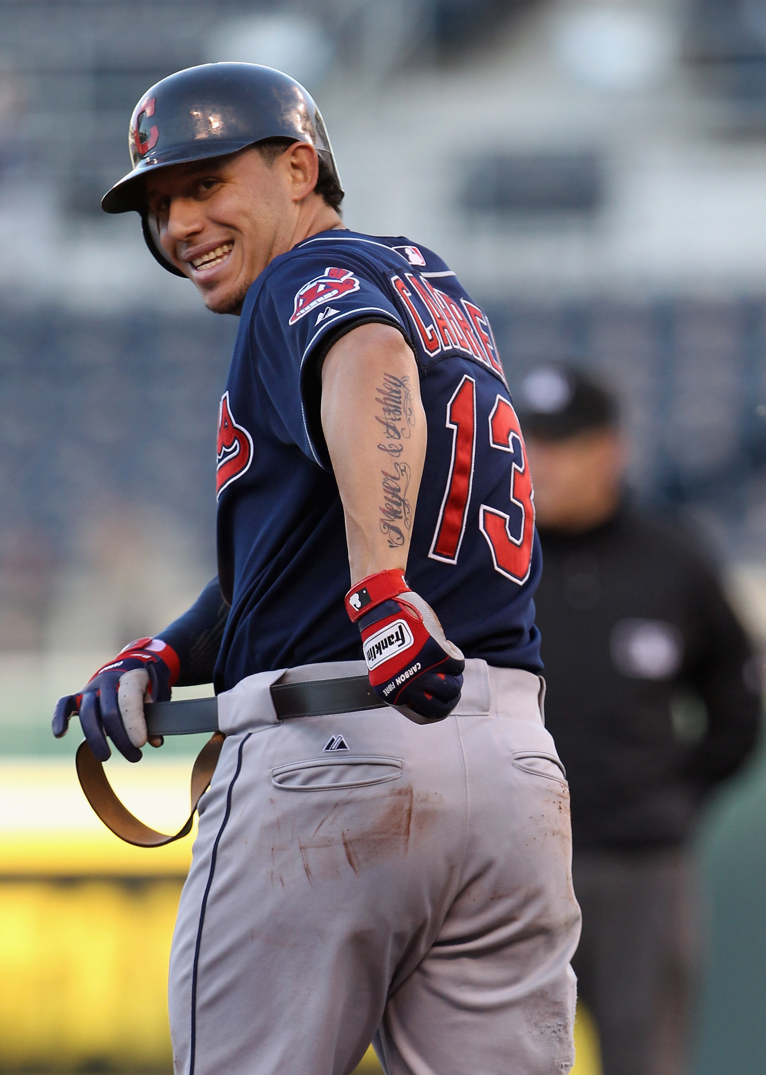 KANSAS CITY, MO - MAY 16: Asdrubal Cabrera #13 of the Cleveland Indians replaces his belt after sliding into second base during the 1st inning of the game against the Kansas City Royals on May 16, 2011 at Kauffman Stadium in Kansas City, Missouri. (Phot KANSAS CITY, MO - MAY 16: Asdrubal Cabrera #13 of the Cleveland Indians replaces his belt after sliding into second base during the 1st inning of the game against the Kansas City Royals on May 16, 2011 at Kauffman Stadium in Kansas City, Missouri. (Phot