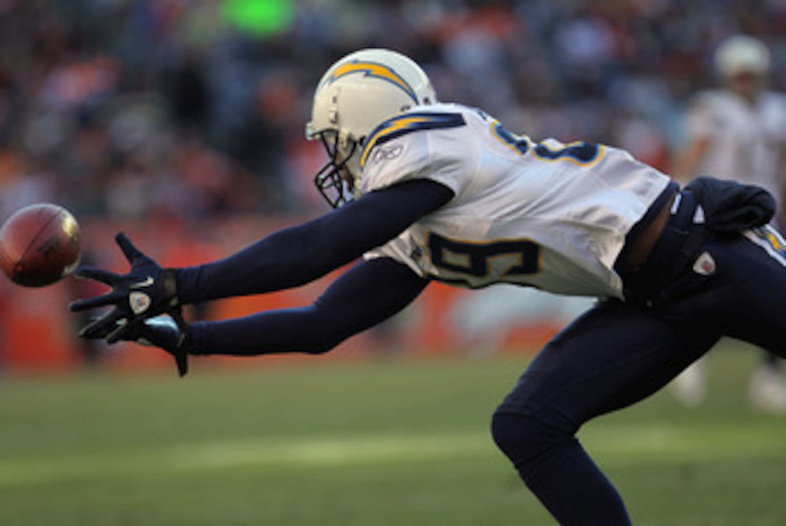 DENVER - JANUARY 02: Wide receiver Seyi Ajirotutu #89 of the San Diego Chargers dives for a pass against the Denver Broncos at INVESCO Field at Mile High on January 2, 2011 in Denver, Colorado. The Chargers defeated the Broncos 33-28. (Photo by Doug Pe DENVER - JANUARY 02: Wide receiver Seyi Ajirotutu #89 of the San Diego Chargers dives for a pass against the Denver Broncos at INVESCO Field at Mile High on January 2, 2011 in Denver, Colorado. The Chargers defeated the Broncos 33-28. (Photo by Doug Pe