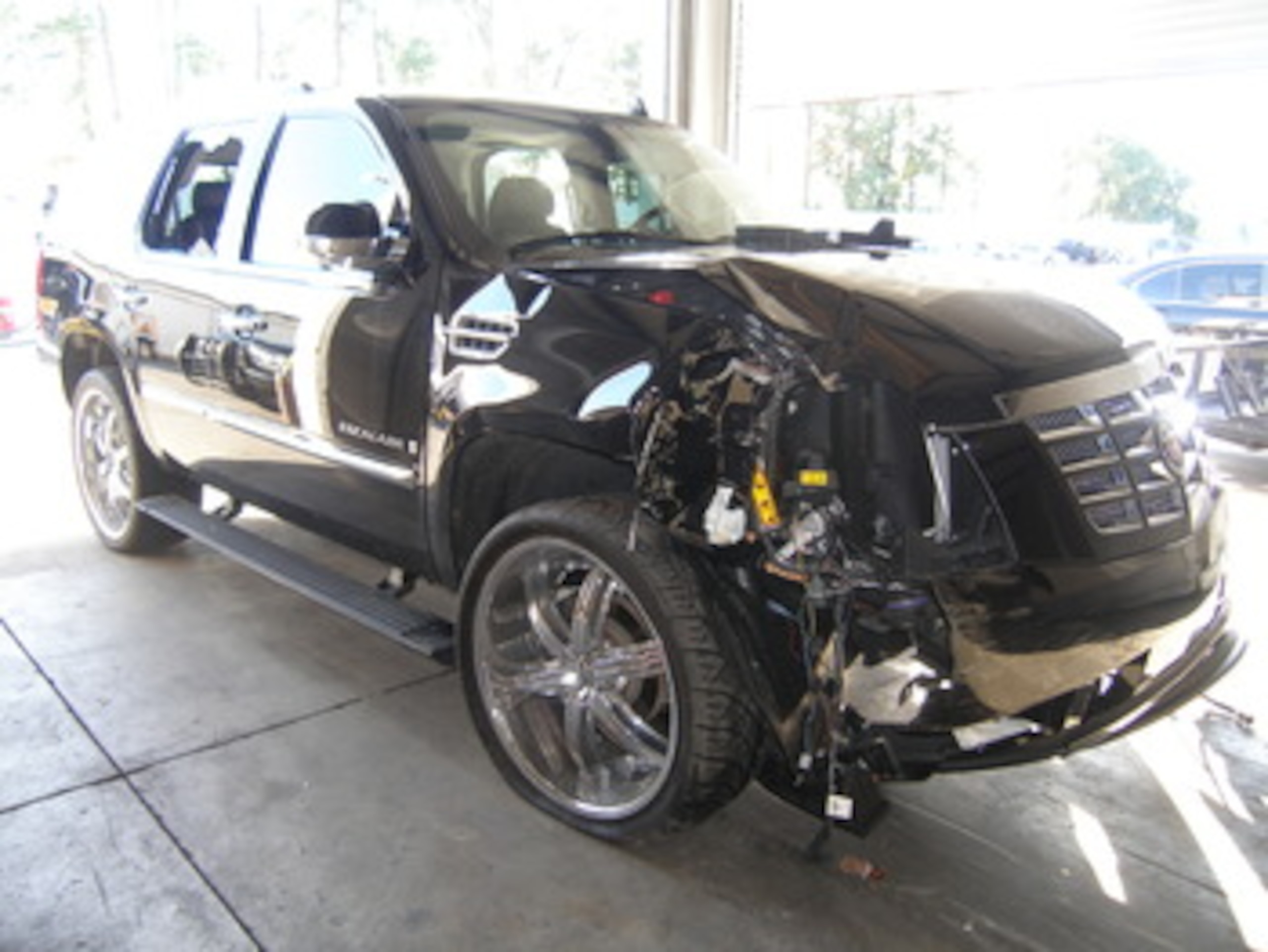 ORLANDO, FL - DECEMBER 02:  In this handout photo provided by The Florida Highway Patrol, the vehicle driven by Tiger Woods during his accident is seen on December 2, 2009 in Orlando, Florida. Woods crashed the SUV into the fire hydrant and tree next to h