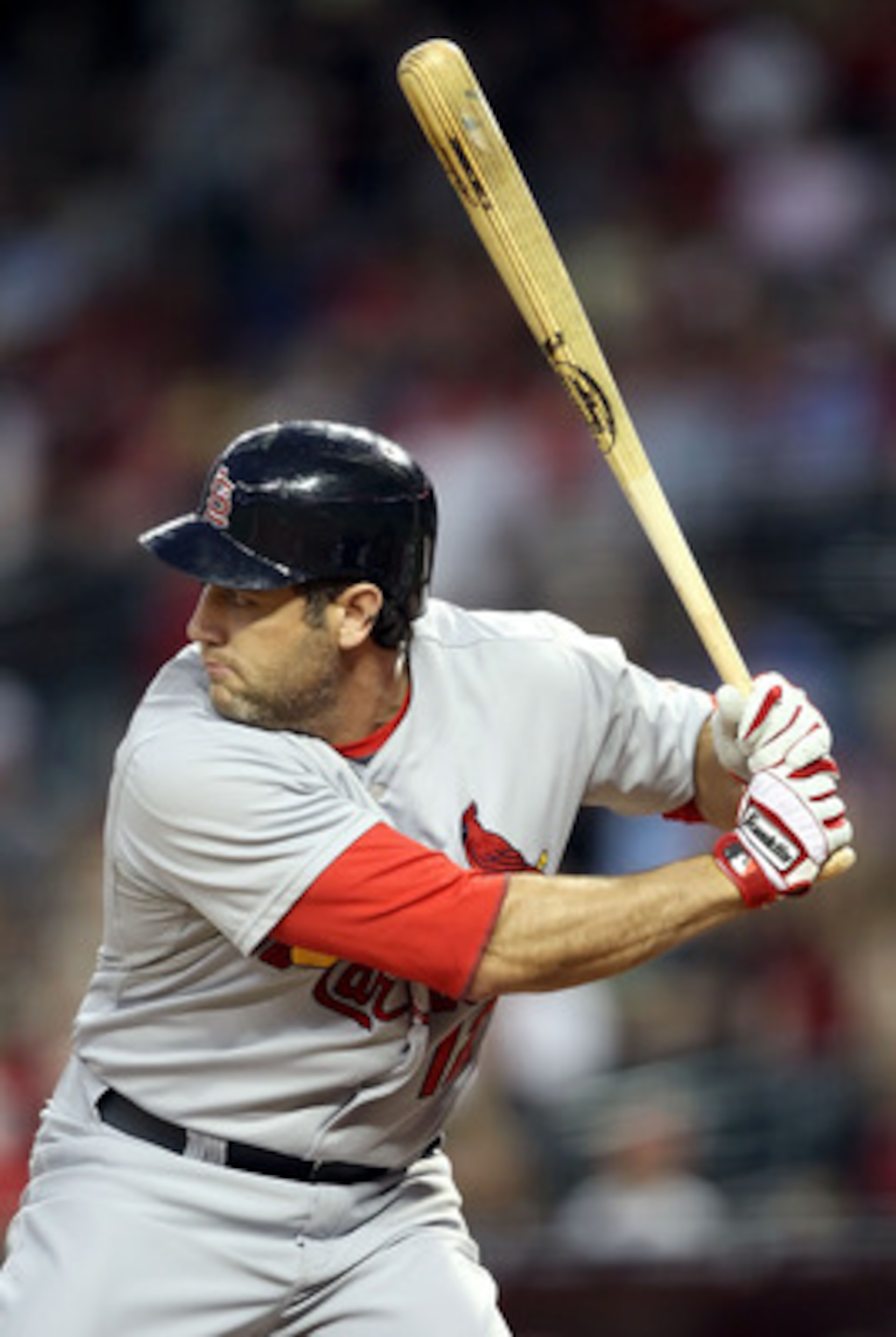 PHOENIX, AZ - APRIL 12:  Lance Berkman #12 of the St. Louis Cardinals bats against the Arizona Diamondbacks during the Major League Baseball game at Chase Field on April 12, 2011 in Phoenix, Arizona. The Diamondbacks defeated the Cardinals 13-8.  (Photo b