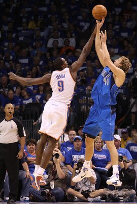 OKLAHOMA CITY, OK - MAY 21:  Dirk Nowitzki #41 of the Dallas Mavericks shoots over Serge Ibaka #9 of the Oklahoma City Thunder in Game Three of the Western Conference Finals during the 2011 NBA Playoffs at Oklahoma City Arena on May 21, 2011 in Oklahoma C