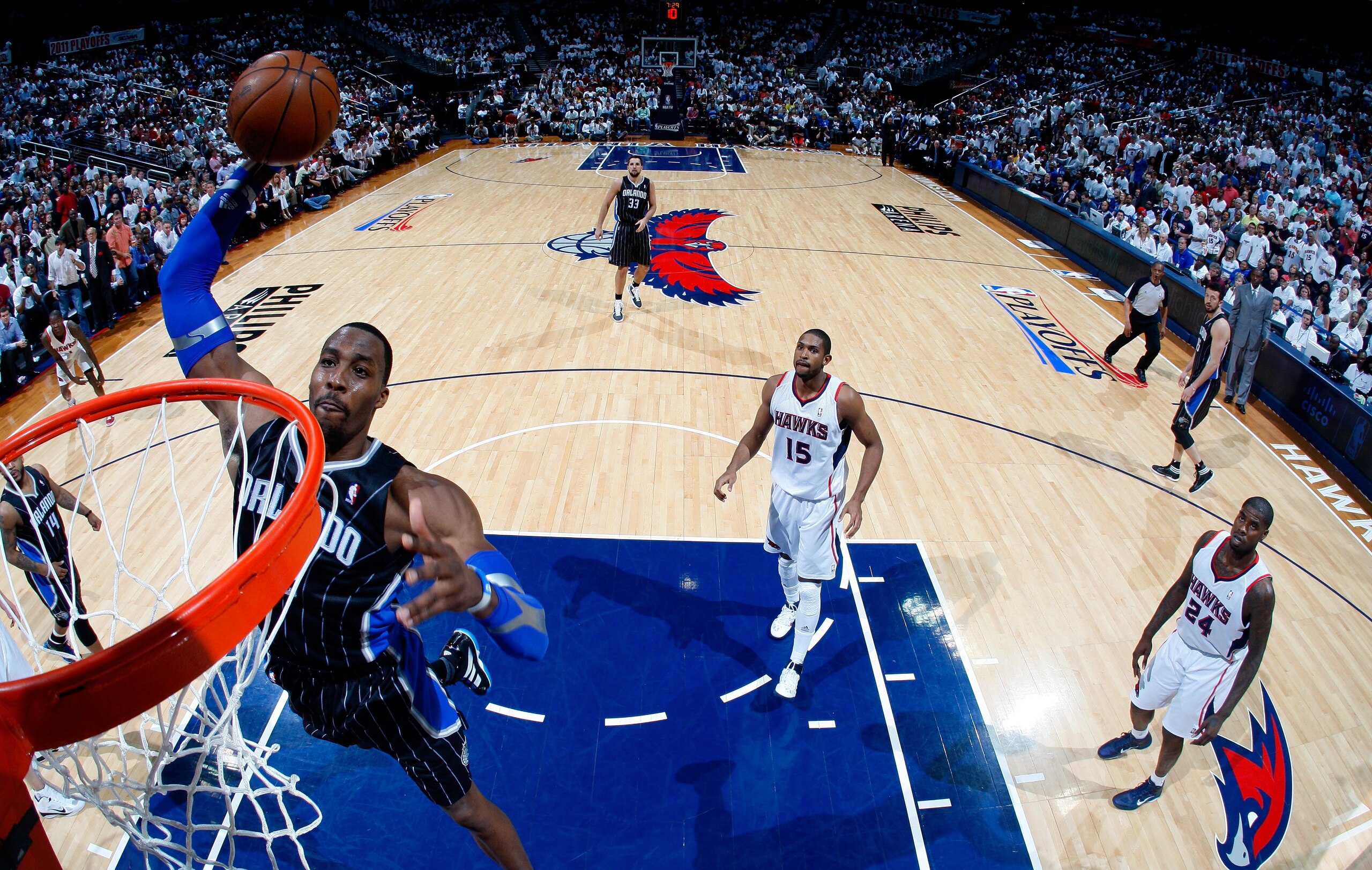 ATLANTA, GA - APRIL 28:  Dwight Howard #12 of the Orlando Magic dunks against the Atlanta Hawks during Game Six of the Eastern Conference Quarterfinals in the 2011 NBA Playoffs at Philips Arena on April 28, 2011 in Atlanta, Georgia.  NOTE TO USER: User ex