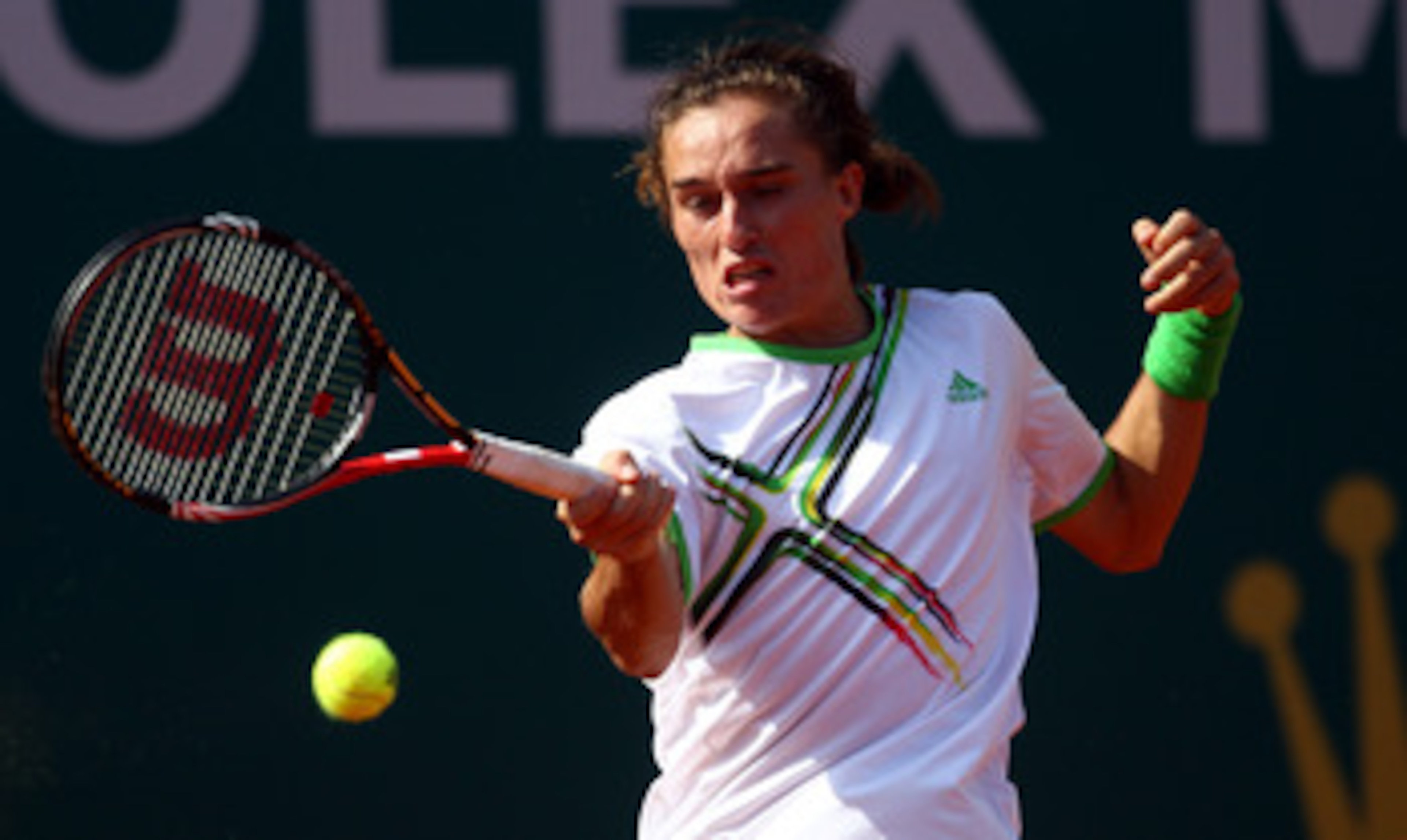 MONACO - APRIL 10:  Alexandr Dolgopolov of Ukraine plays a forehand in his match against Ernests Gulbis of Latvia during Day One of the ATP Masters Series Tennis at the Monte Carlo Country Club on April 10, 2011 in Monte Carlo, Monaco.  (Photo by Julian F