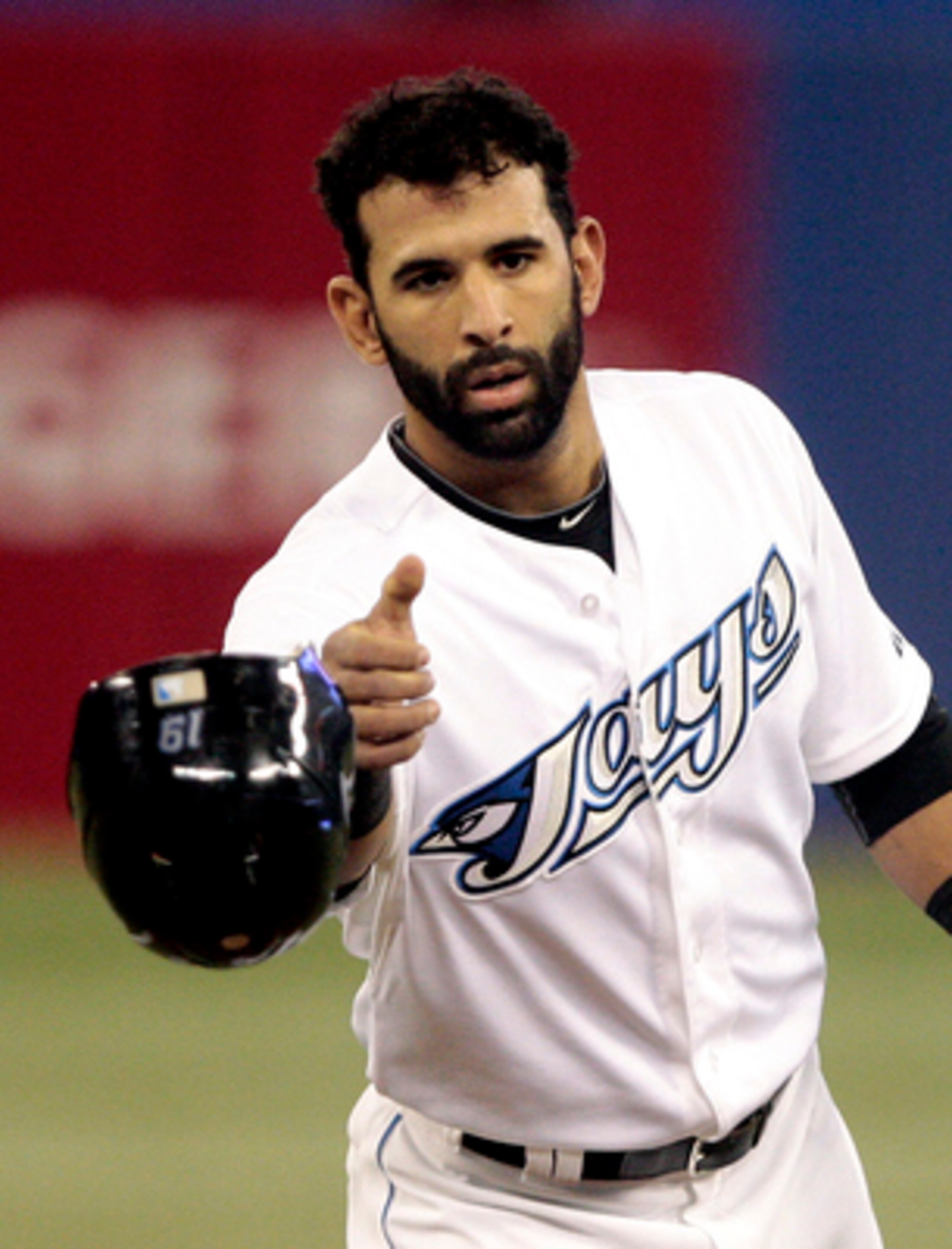 TORONTO, CANADA - MAY 18: Jose Bautista #19 of the Toronto Blue Jays throws his helmet after a third out against the Tampa Bay Rays during MLB action at the Rogers Centre May 18, 2011 in Toronto, Ontario, Canada. (Photo by Abelimages/Getty Images)