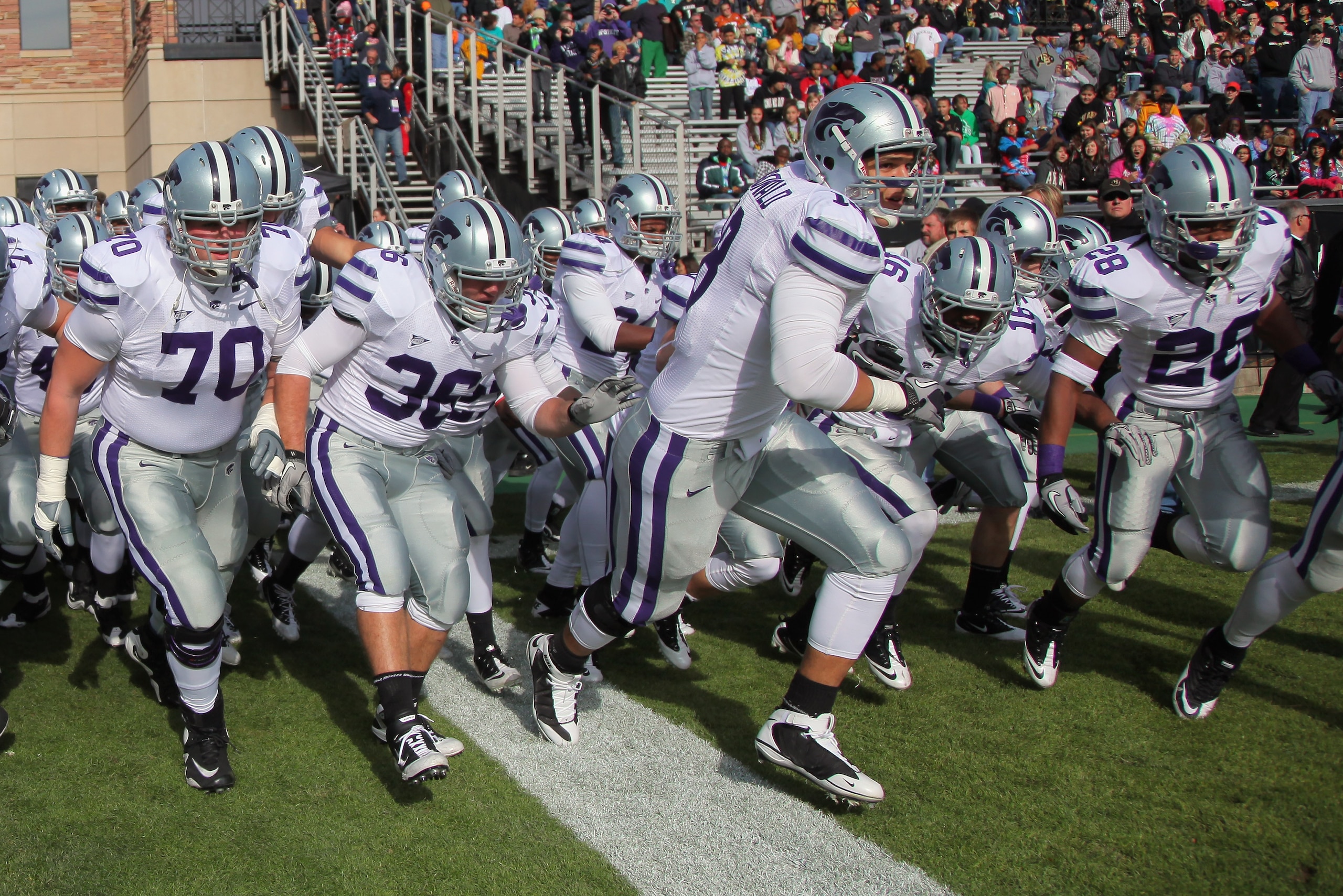 BOULDER, CO - NOVEMBER 20:  The Kansas State Wildcats take the field to face the Colorado Buffaloes at Folsom Field on November 20, 2010 in Boulder, Colorado. Colorado defeated Kansas State 44-36.  (Photo by Doug Pensinger/Getty Images)