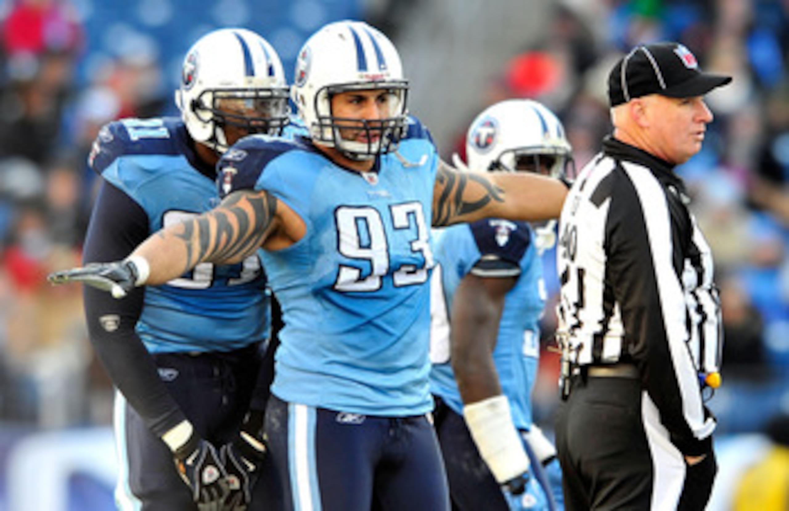 NASHVILLE, TN - DECEMBER 19:  Jason Babin #93 of the Tennessee Titans gestures to the Houston Texans offense during a timeout at LP Field on December 19, 2010 in Nashville, Tennessee. The Titans defeated the Texans, 31-17.  (Photo by Grant Halverson/Getty
