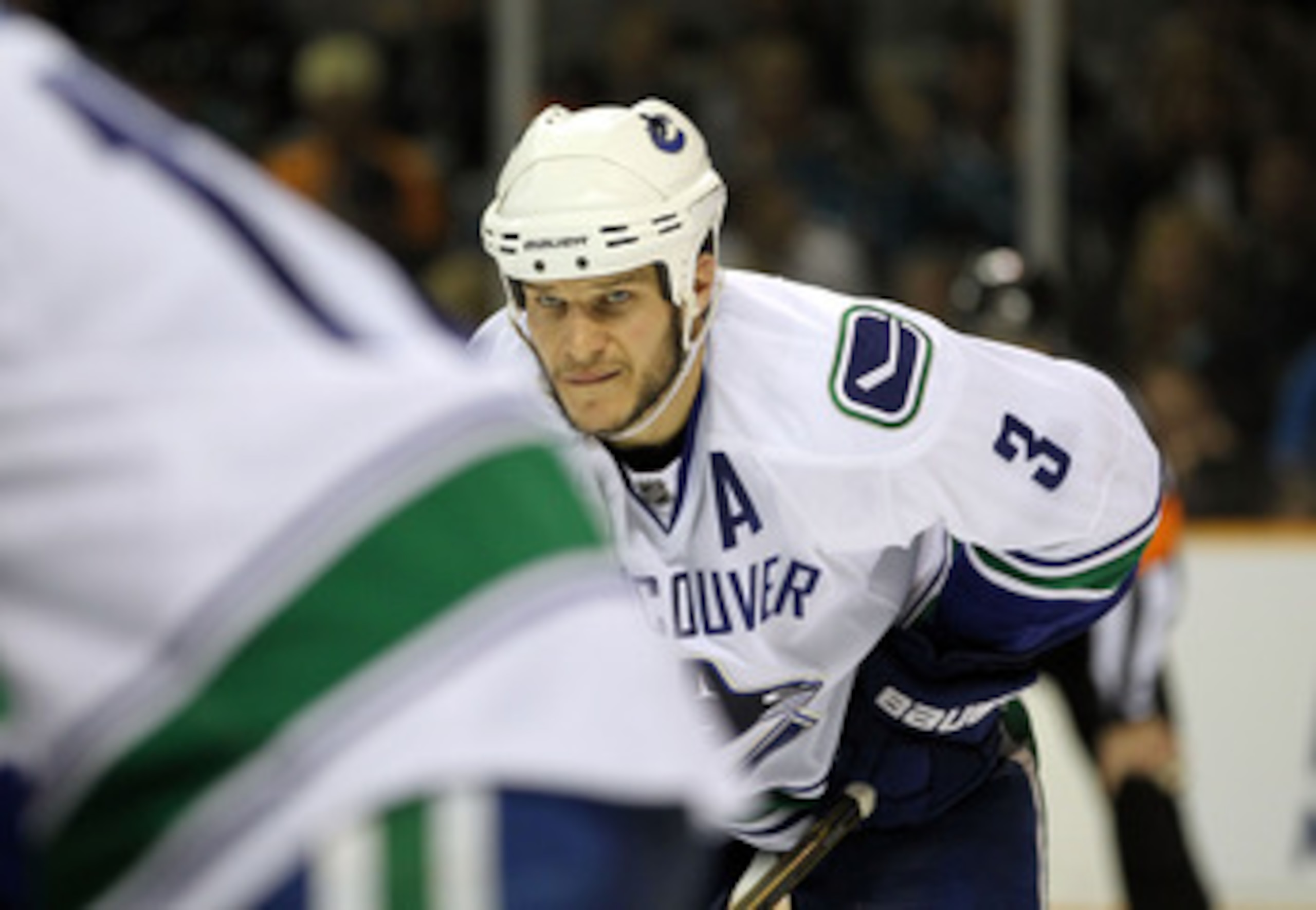 SAN JOSE, CA - MAY 22: Kevin Bieksa #3 of the Vancouver Canucks lines up in his defensive position prior to a faceoff against the San Jose Sharks in Game Four of the Western Conference Finals during the 2011 Stanley Cup Playoffs at HP Pavilion on May 22, SAN JOSE, CA - MAY 22: Kevin Bieksa #3 of the Vancouver Canucks lines up in his defensive position prior to a faceoff against the San Jose Sharks in Game Four of the Western Conference Finals during the 2011 Stanley Cup Playoffs at HP Pavilion on May 22,