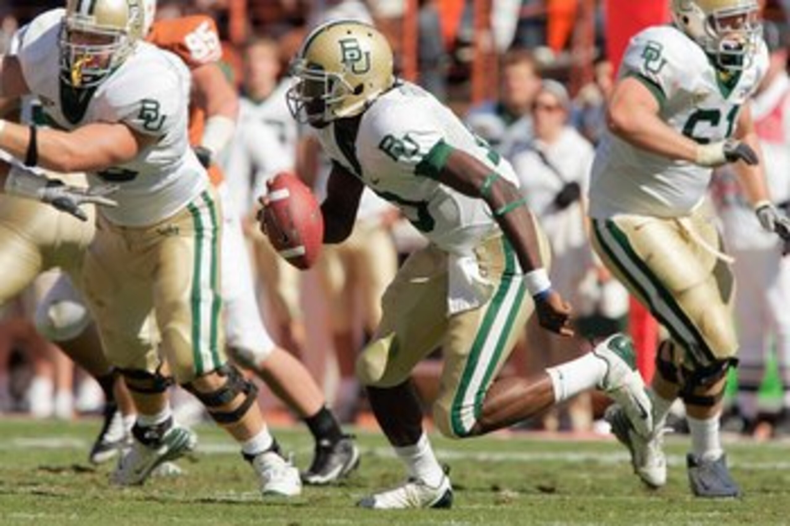 AUSTIN, TX - NOVEMBER 8:  Quarterback Robert Griffin #10 of the Baylor Bears runs the ball during the game against the Texas Longhorns on November 8, 2008 at Darrell K Royal-Texas Memorial Stadium in Austin, Texas.  Texas won 45-21. (Photo by Brian Bahr/G
