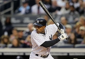 NEW YORK, NY - MAY 14:  Curtis Granderson #14 of the New York Yankees bats against the Boston Red Sox on May 14, 2011 at Yankee Stadium in the Bronx borough of New York City.  (Photo by Jim McIsaac/Getty Images)