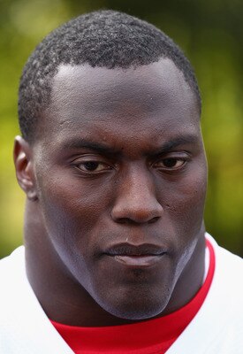 HERTFORD, ENGLAND - OCTOBER 27:  Takeo Spikes of the San Francisco 49ers talks to the media outside The Grove Hotel on October 27, 2010 in Hertford, England. The San Francisco 49ers will meet the Denver Broncos in the NFL International Series regular-seas